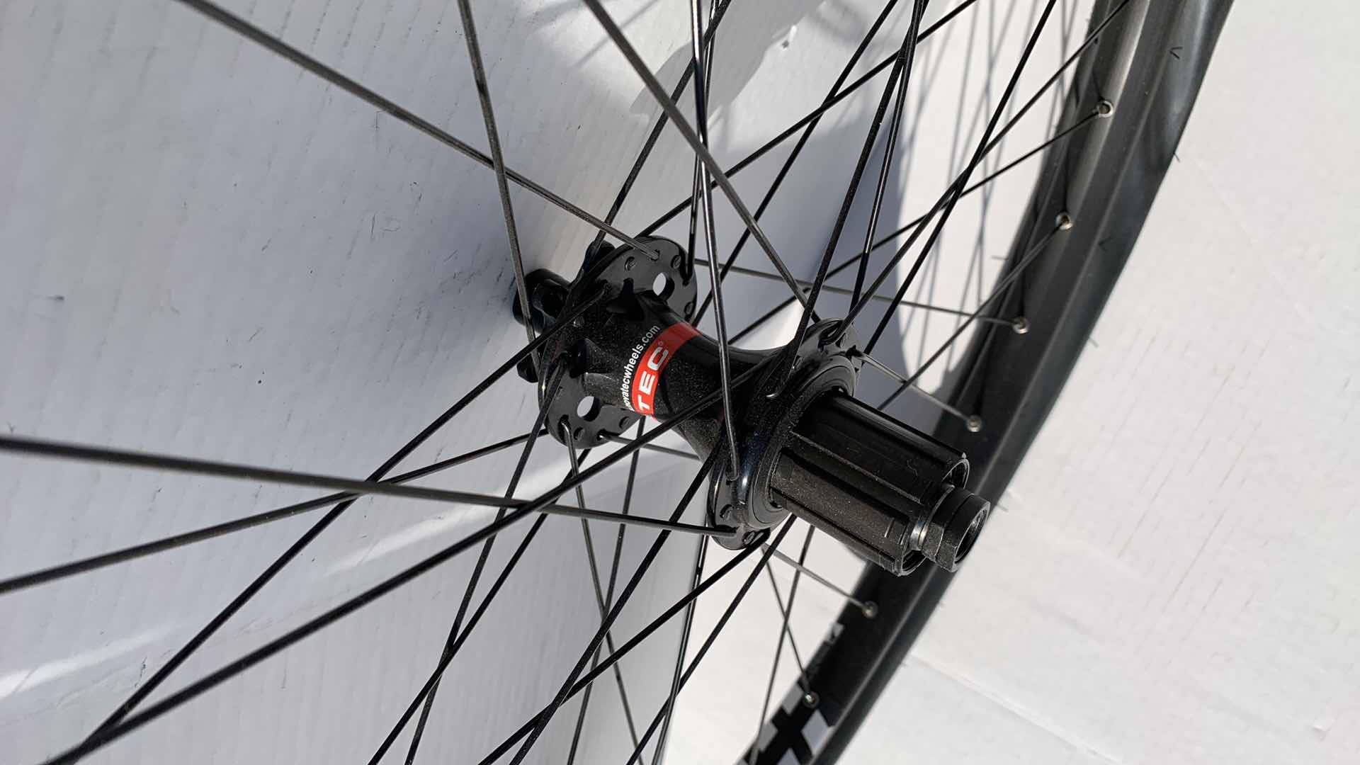 Photo 1 of 2-BICYCLE RIMS AND 1 TIRE. 27.5"D FOR A ROAD BIKE.