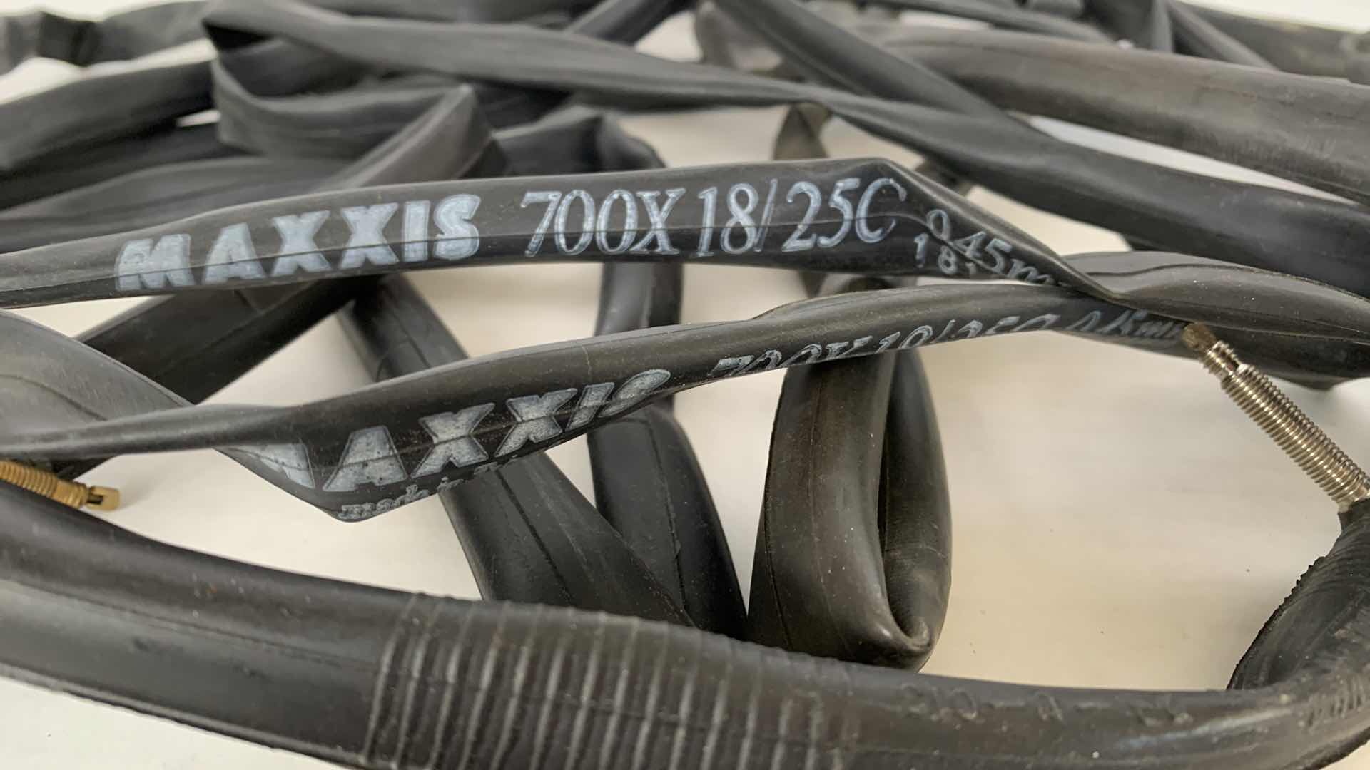 Photo 1 of 4-BICYCLE TIRES AND RIM STRIP