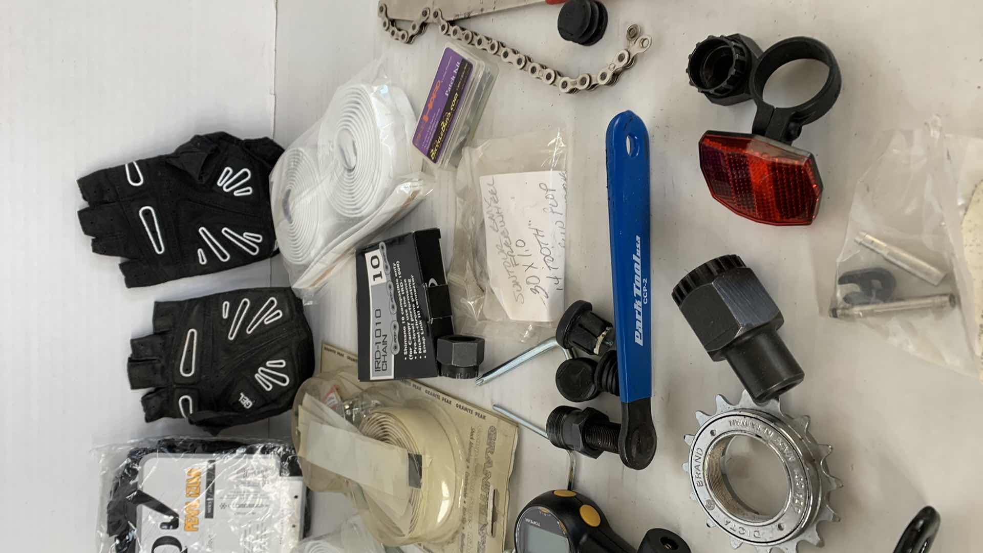 Photo 1 of ASSORTED BICYCLEPARTS AND ACCESSORIES. TOOLS, GLOVES, GAUGES ETC.