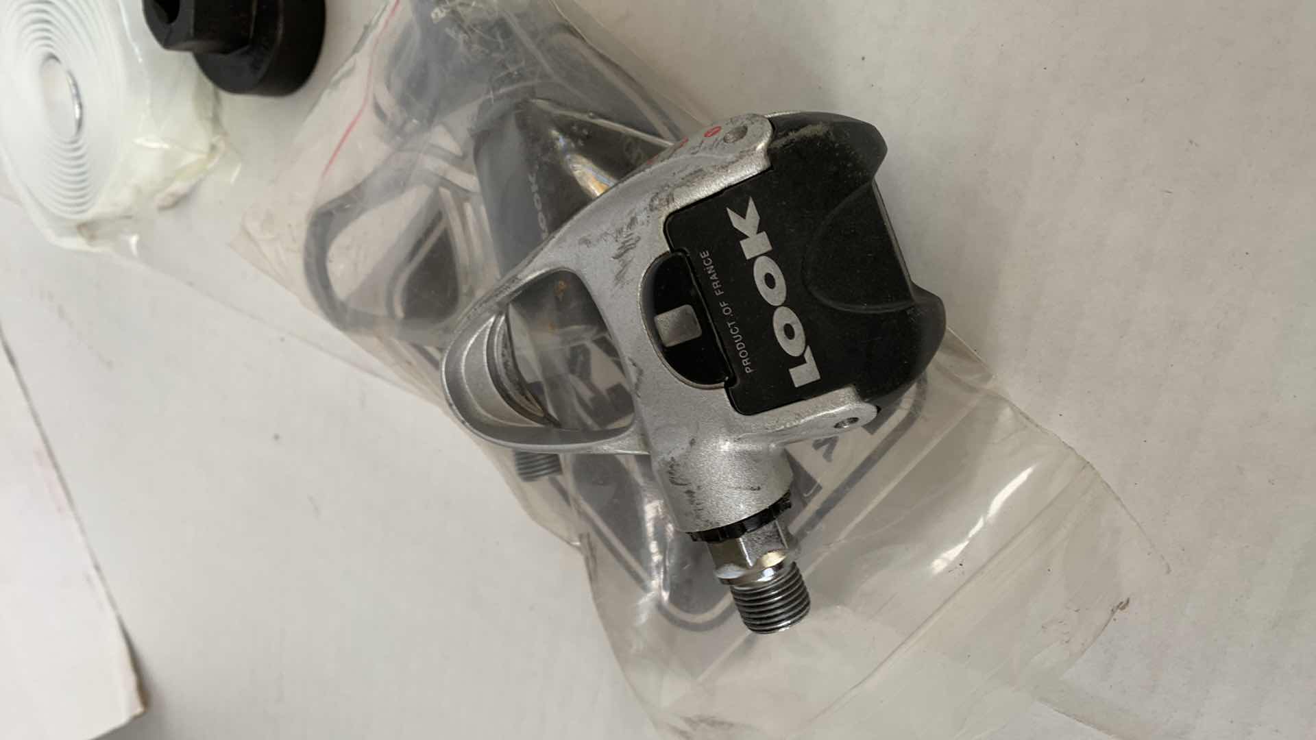 Photo 1 of ASSORTED BICYCLEPARTS AND ACCESSORIES. TOOLS, GLOVES, GAUGES ETC.