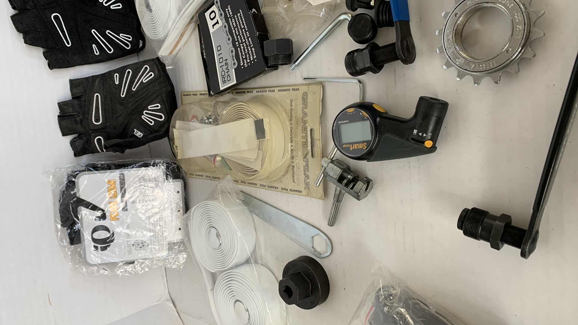 Photo 1 of ASSORTED BICYCLEPARTS AND ACCESSORIES. TOOLS, GLOVES, GAUGES ETC.