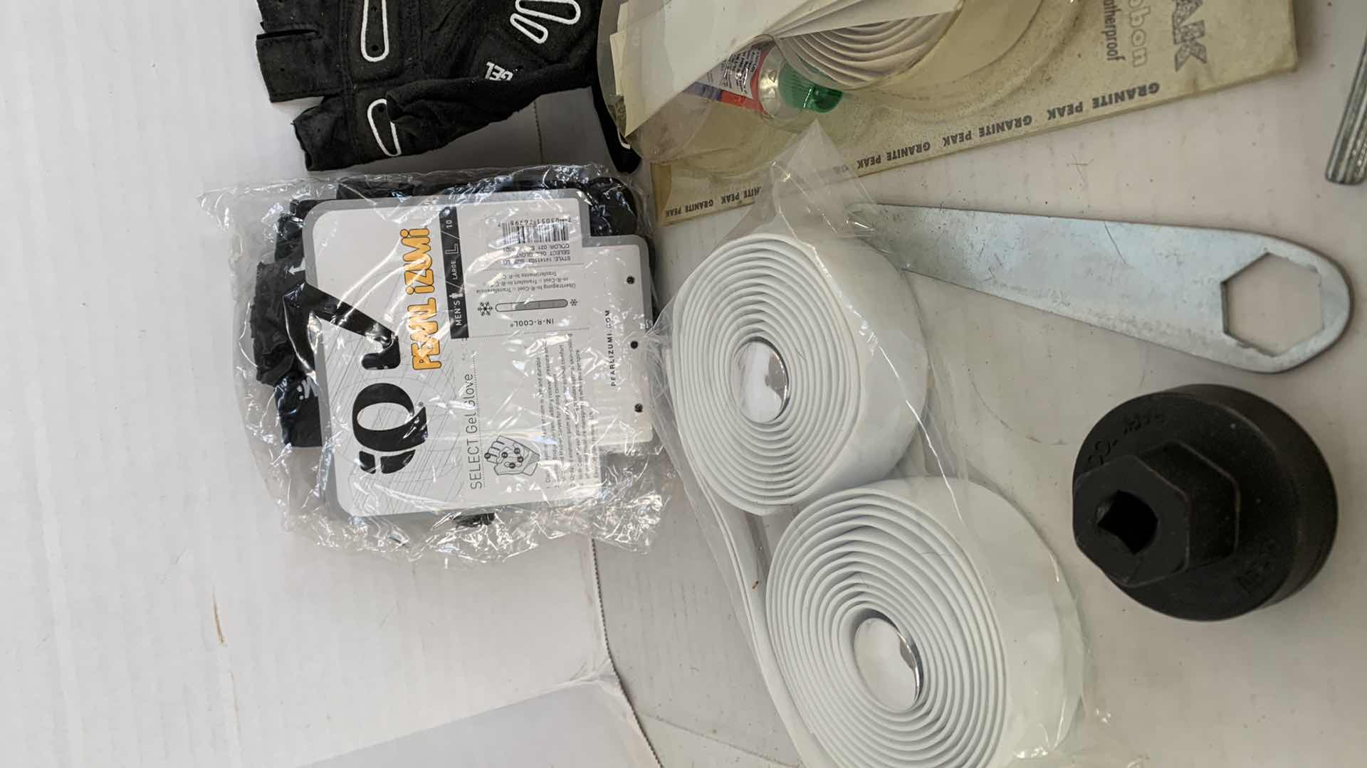 Photo 1 of ASSORTED BICYCLEPARTS AND ACCESSORIES. TOOLS, GLOVES, GAUGES ETC.