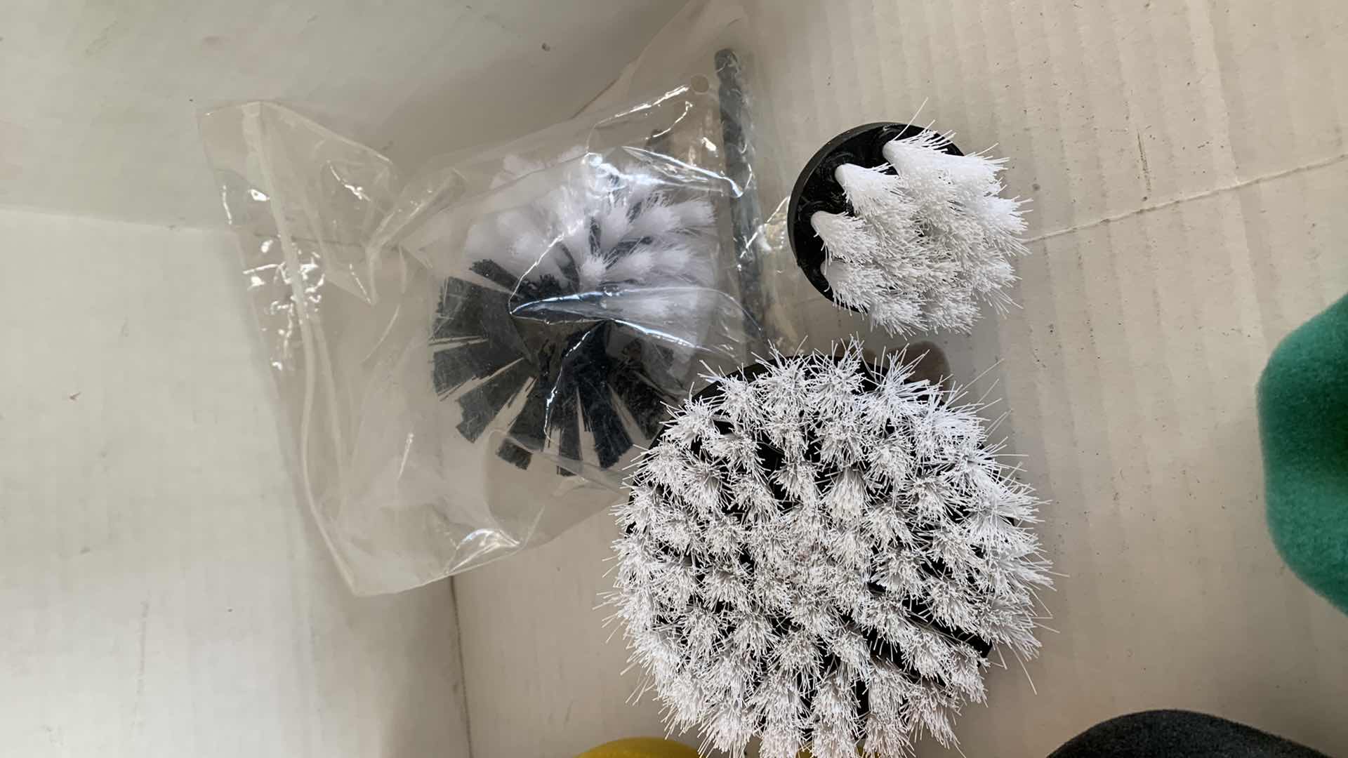 Photo 4 of CAR POLISHING PADS AND BRUSHES OF VARIOUS SIZES AND TEXTURES.