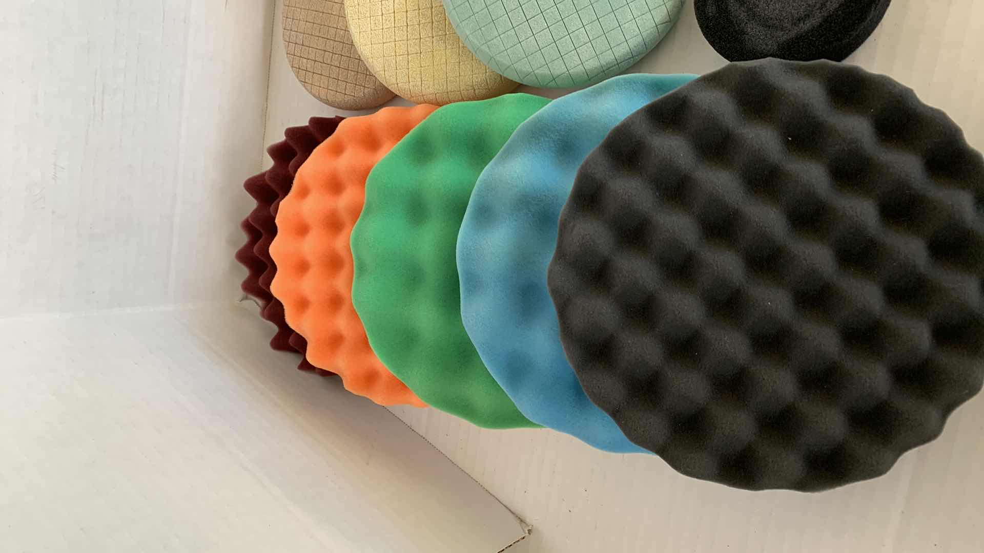 Photo 2 of CAR POLISHING PADS AND BRUSHES OF VARIOUS SIZES AND TEXTURES.