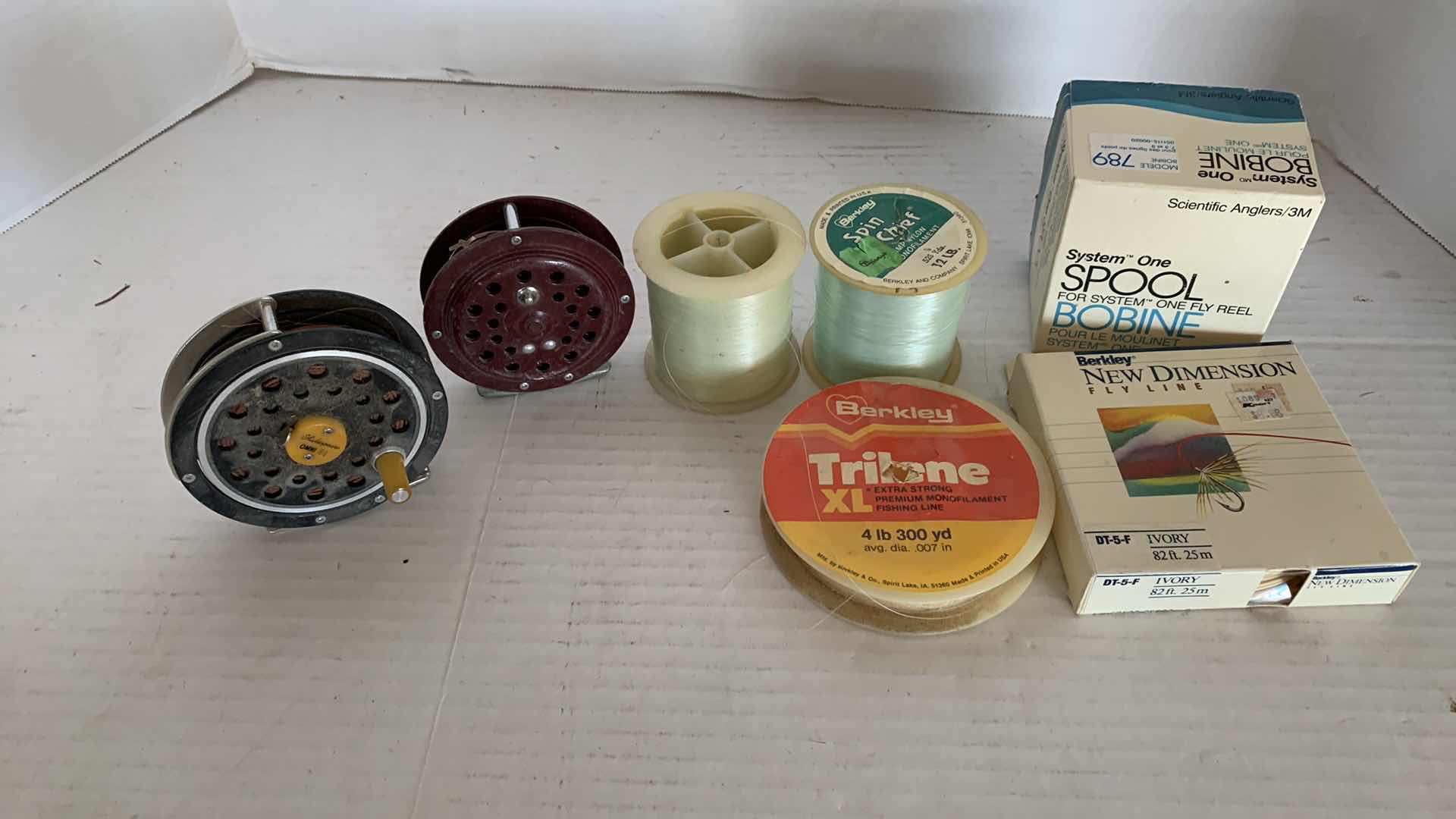 Photo 1 of 2-FLY FISHING REELS AND FISHING LINE