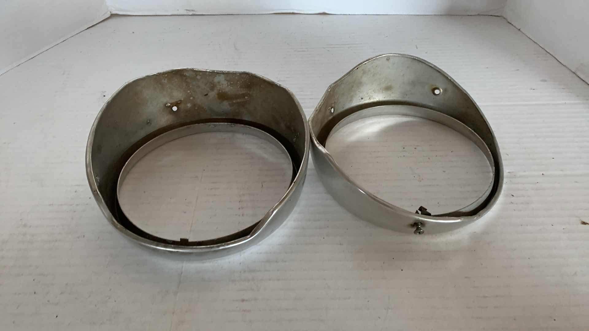 Photo 1 of AUTO PARTS- 1-PAIR OF VINTAGE 1964 FORD GALAXIE 500 HEADLIGHT RINGS.