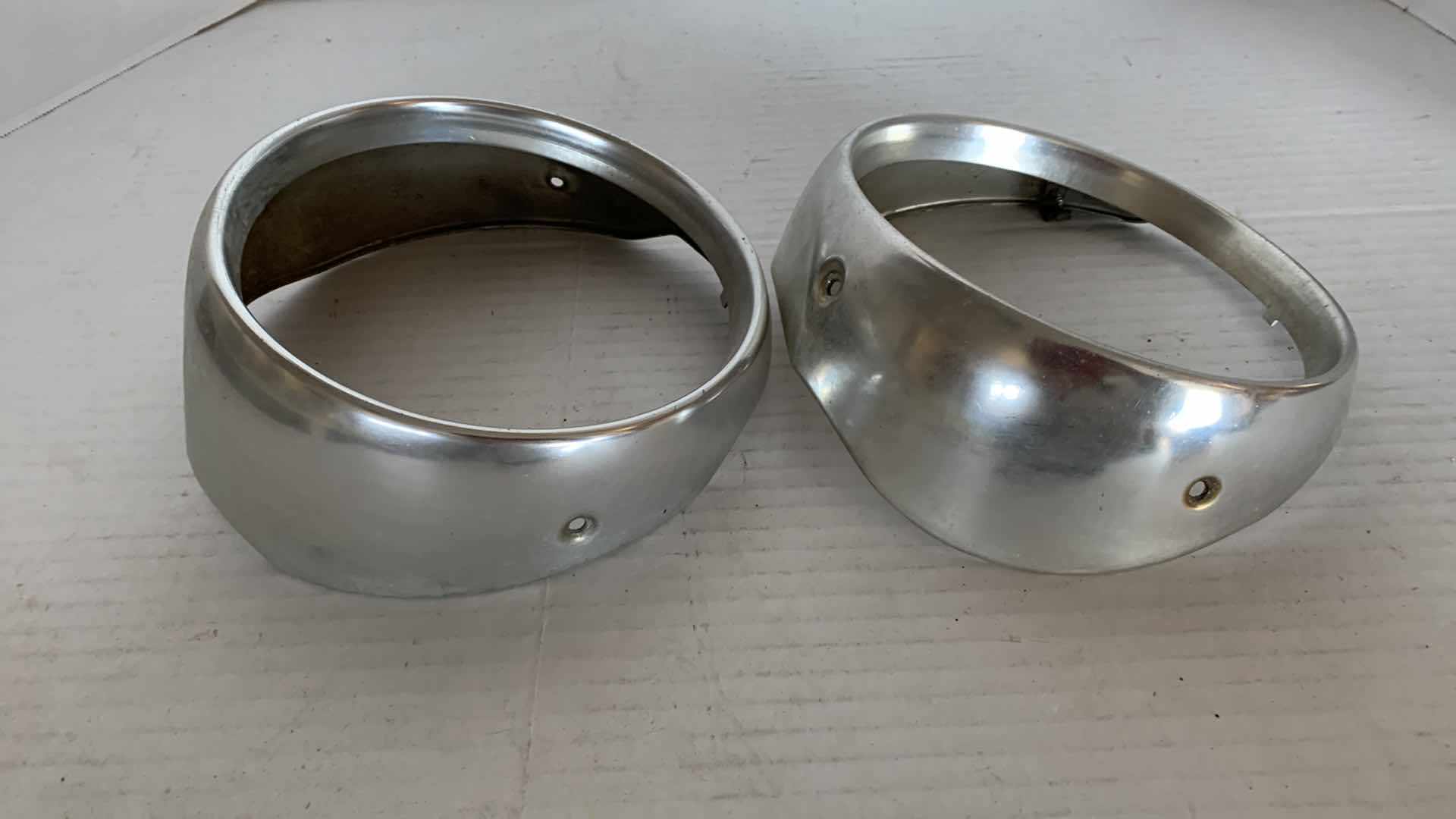 Photo 1 of AUTO PARTS- 1-PAIR OF VINTAGE 1964 FORD GALAXIE 500 HEADLIGHT RINGS.
