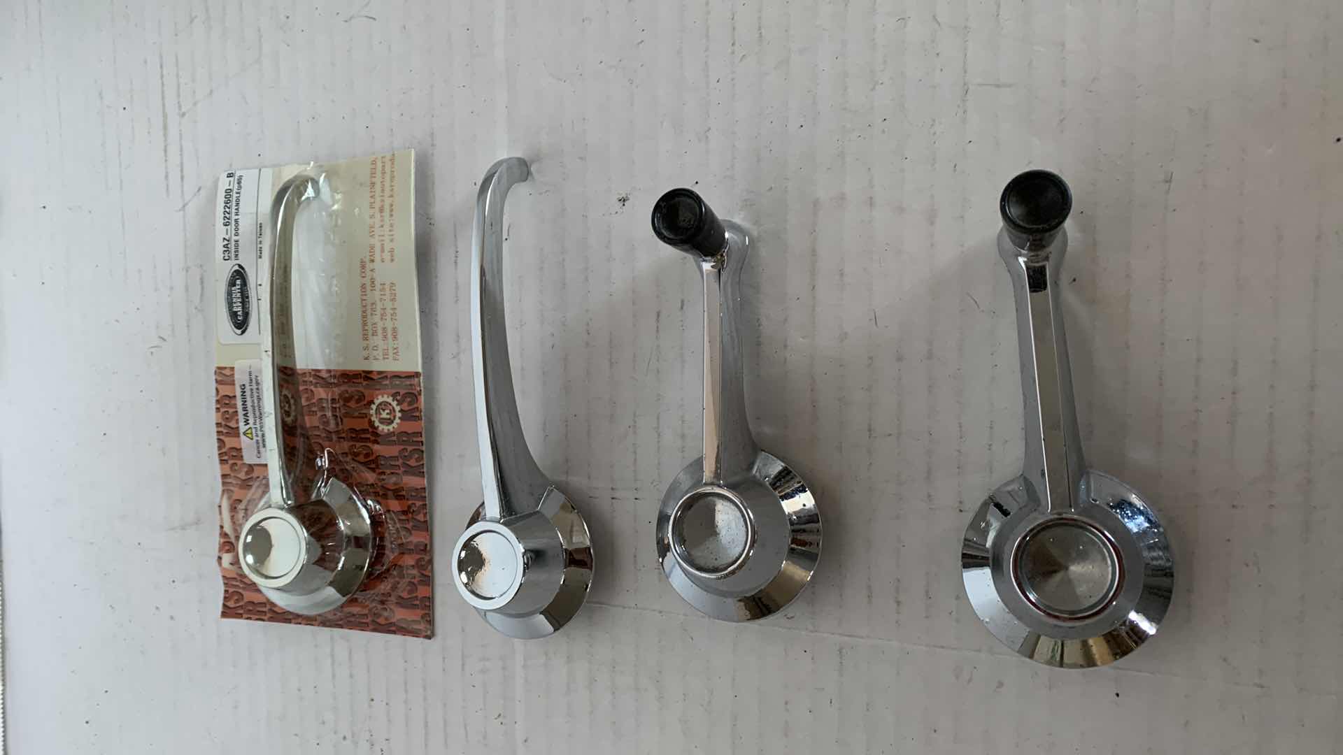 Photo 1 of 4-FORD AUTOMOBILE DOOR AND WINDOW HANDLES