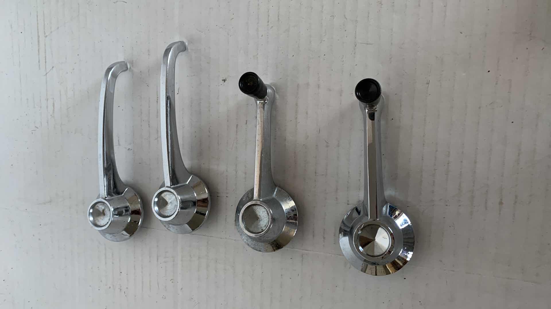 Photo 1 of 4-VINTAGE FORD AUTOMOBILE DOOR AND ROLL WINDOW HANDLES. AUTO PARTS.
