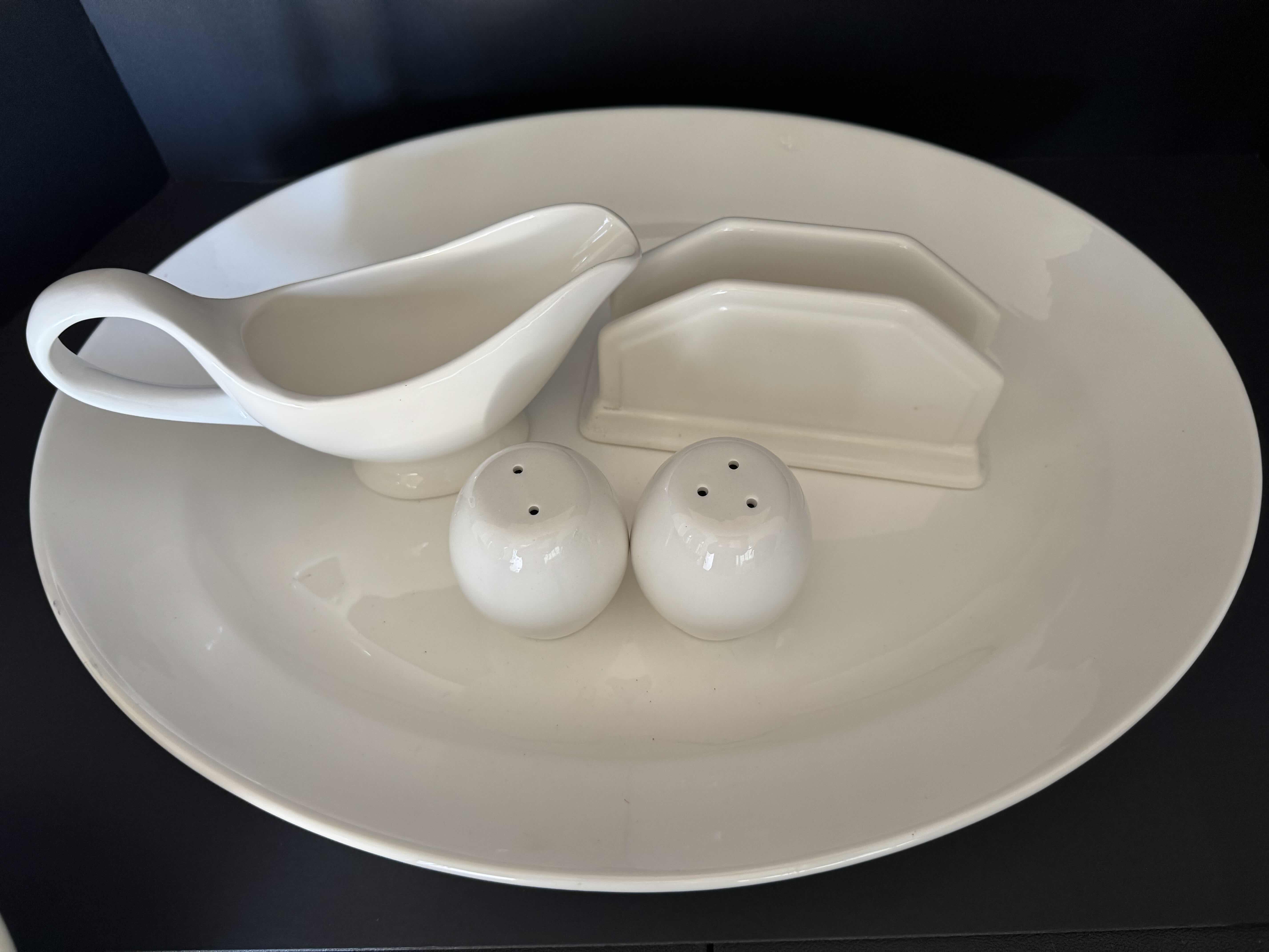 Photo 1 of KITCHEN ESSENTIALS. OFF WHITE SERVING PLATTER, NAPKIN HOLDER, GRAVY BOAT, SALT & PEPPER SHAKERS.