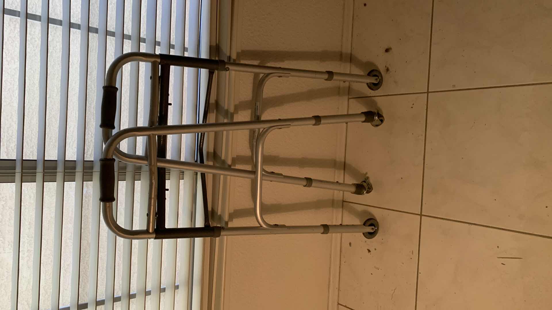 Photo 1 of MEDICAL EQUIPTMENT, WALKER WITH WHEELS.