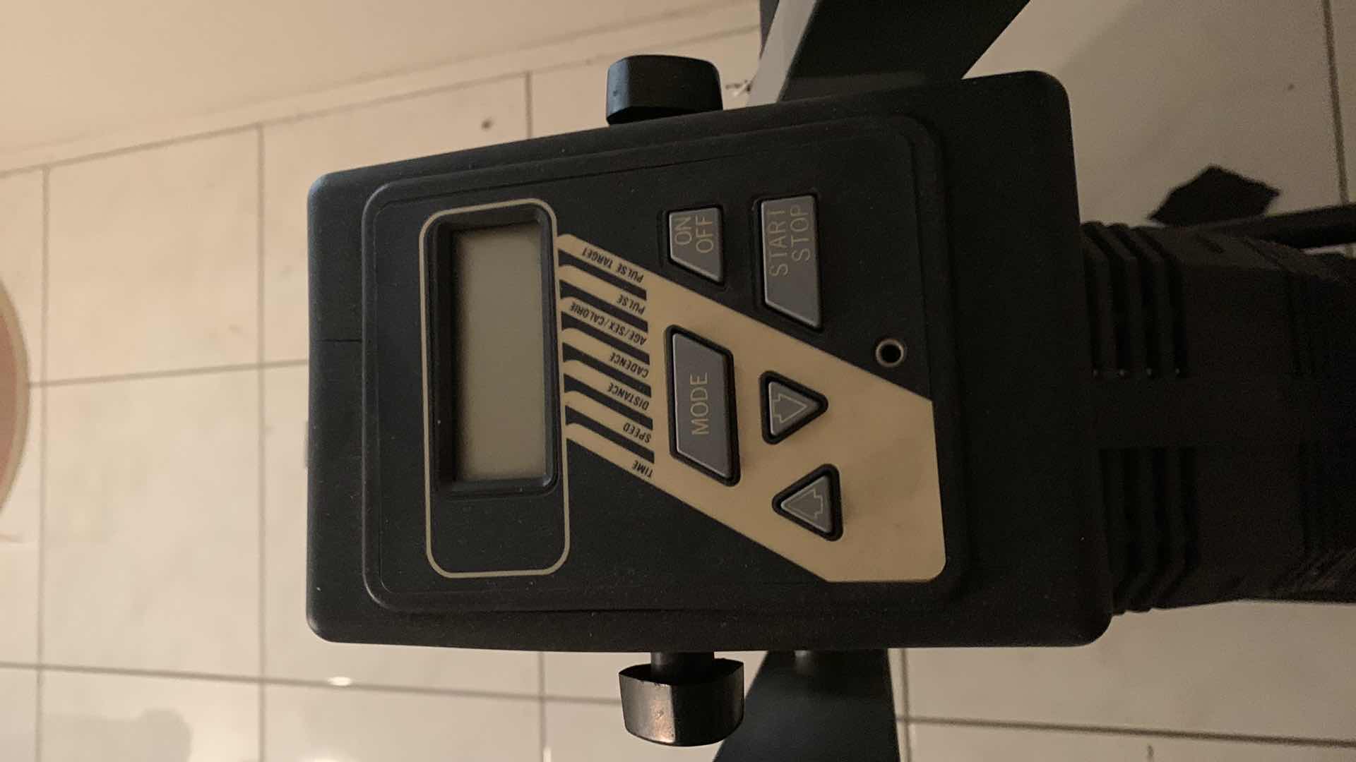 Photo 1 of WYNTONE STATIONARY BICYCLE WITH MOVEABLE, ALTERNATING HANDLES.