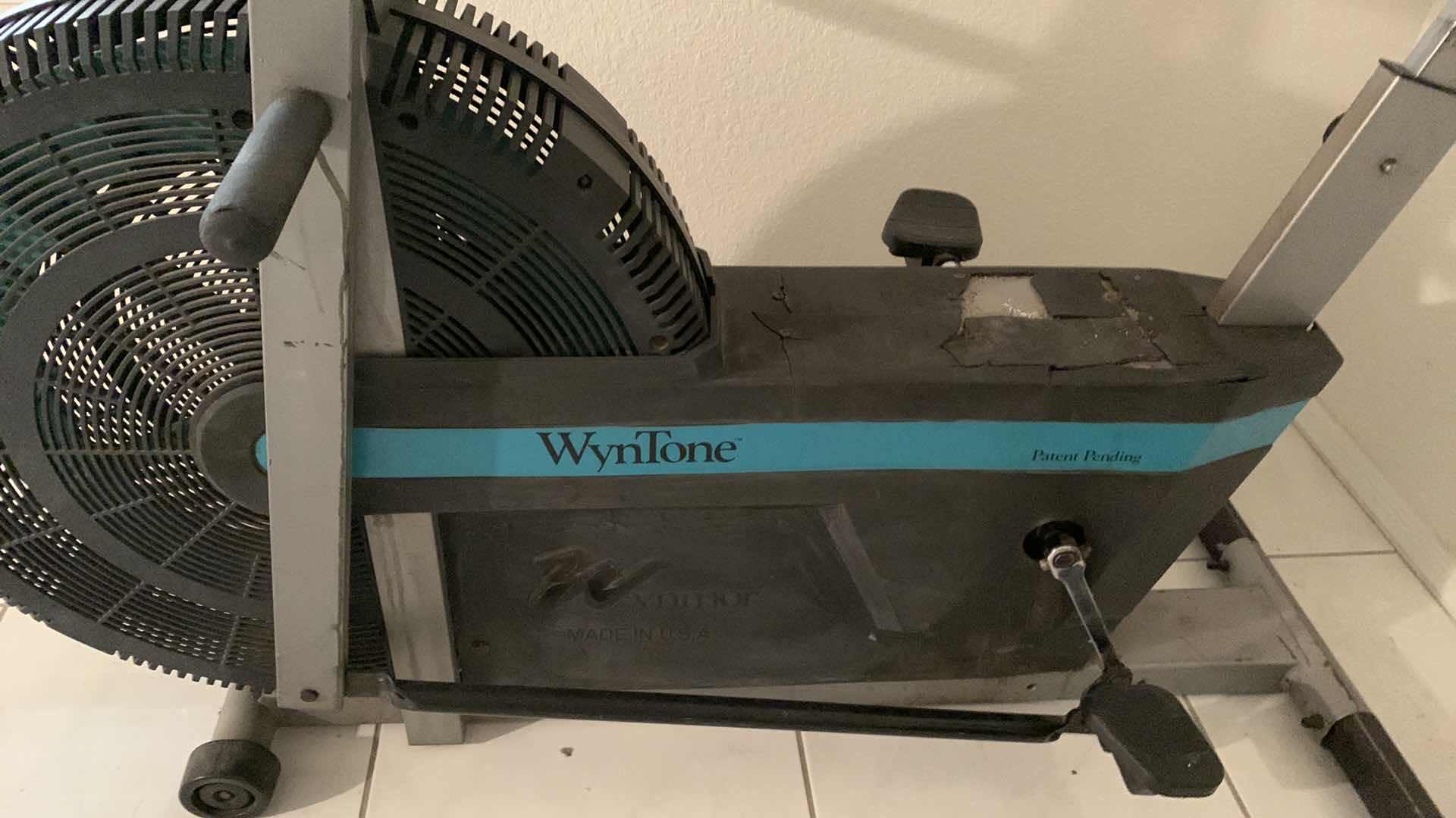 Photo 1 of WYNTONE STATIONARY BICYCLE WITH MOVEABLE, ALTERNATING HANDLES.