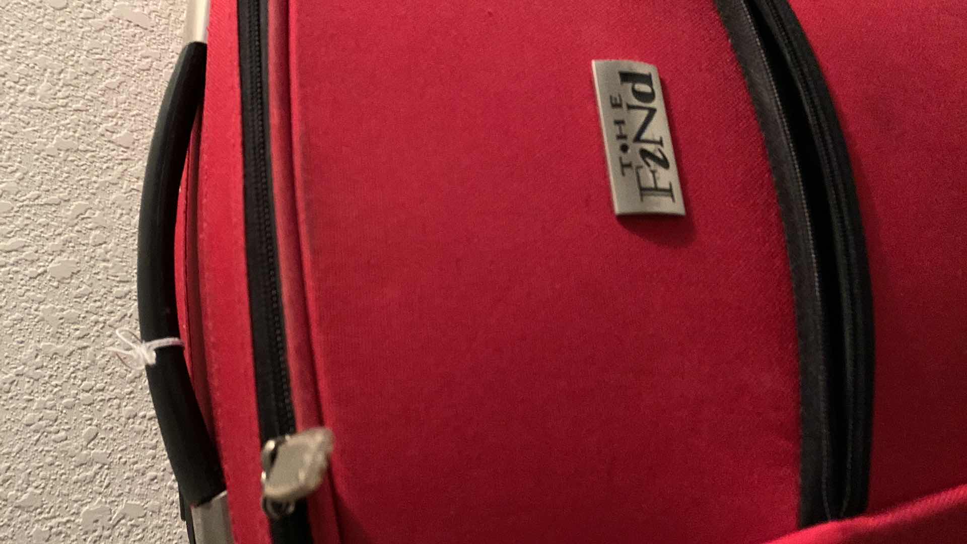 Photo 1 of CARRY ON ROLLER LUGGAGE, AND A LEATHER DOCUMENT TOTE BAG.