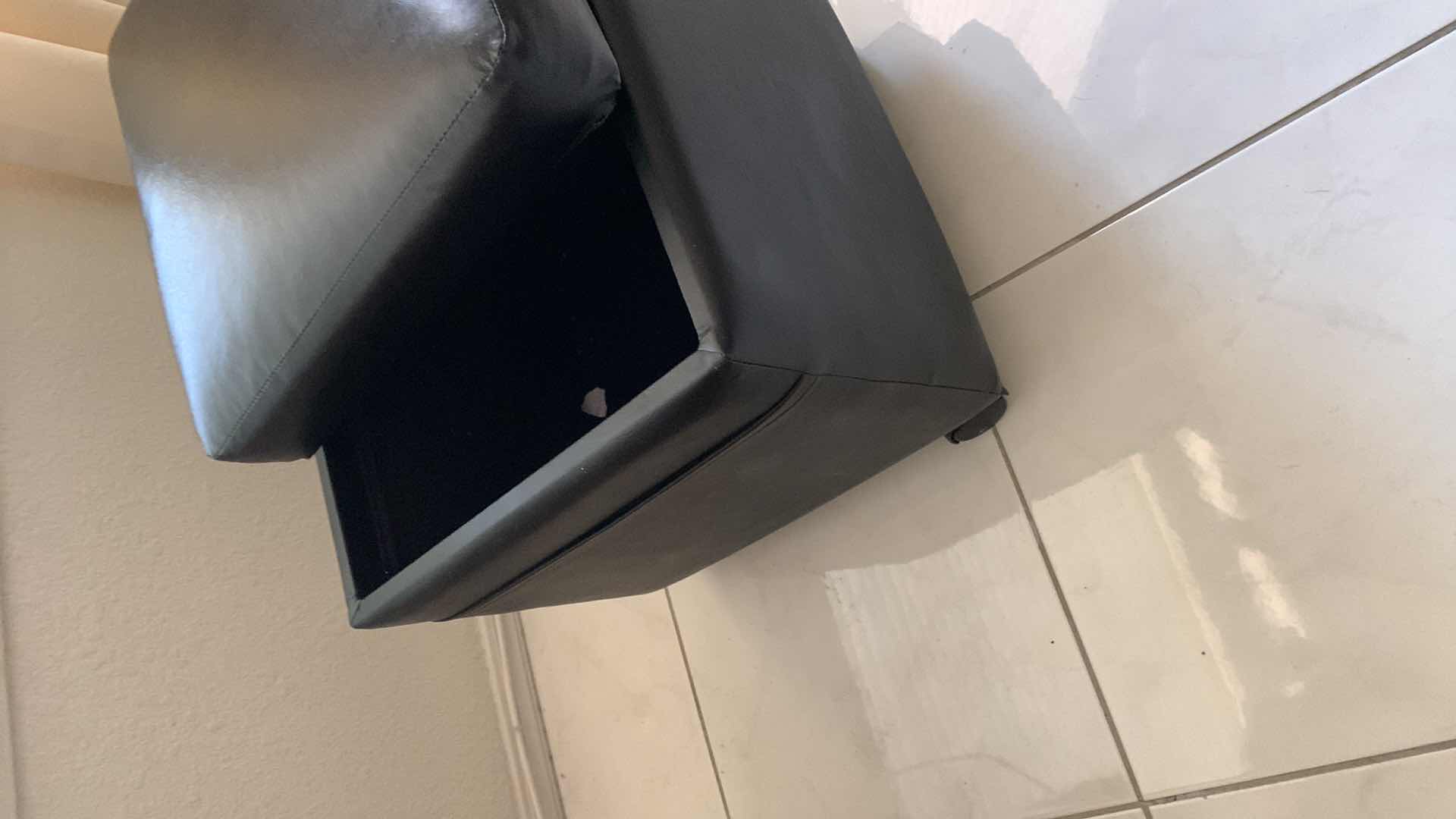 Photo 2 of LEATHER OTTOMAN WITH WHEELS AND STORAGE 17” X 17” H 19”