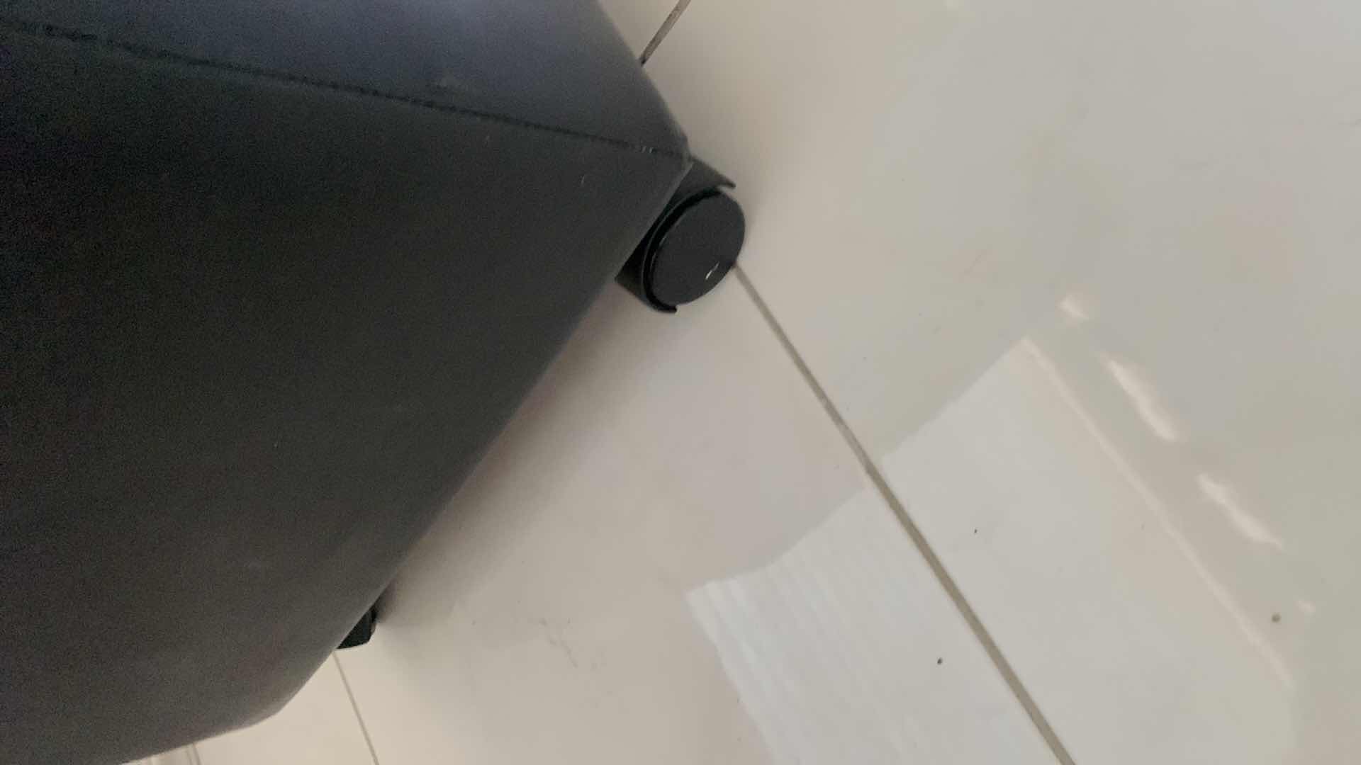 Photo 1 of LEATHER OTTOMAN WITH WHEELS AND STORAGE 17” X 17” H 19”