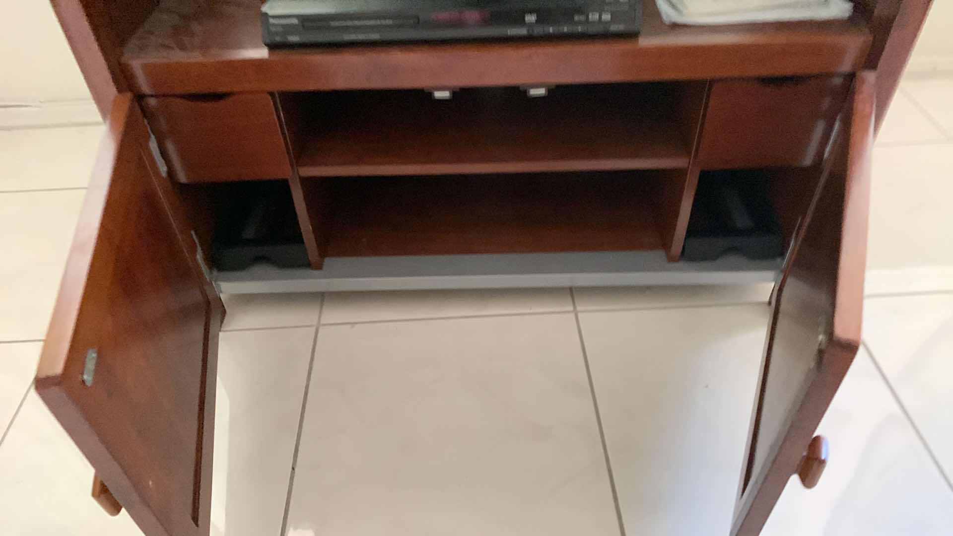 Photo 2 of SAMSUNG 40” TELEVISION WITH DVD PLAYER AND STAND