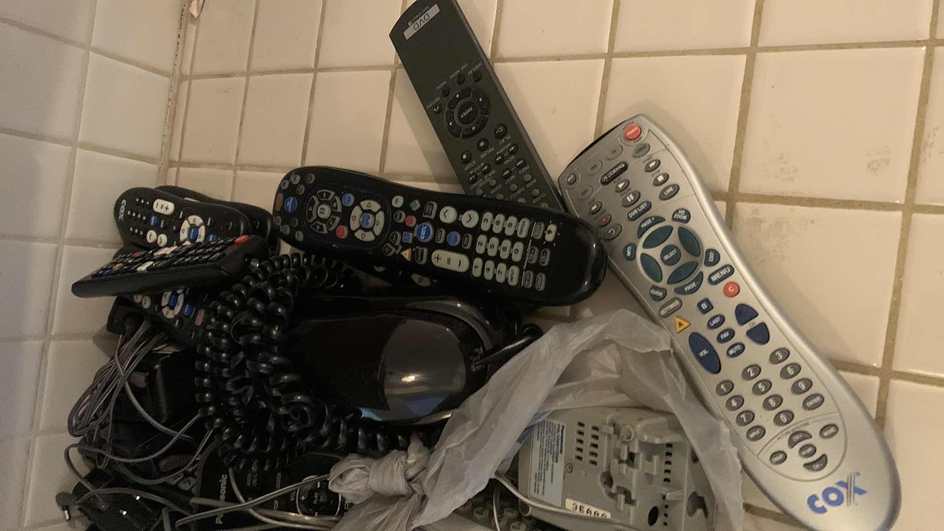 Photo 3 of PHONES AND TELEVISION REMOTES