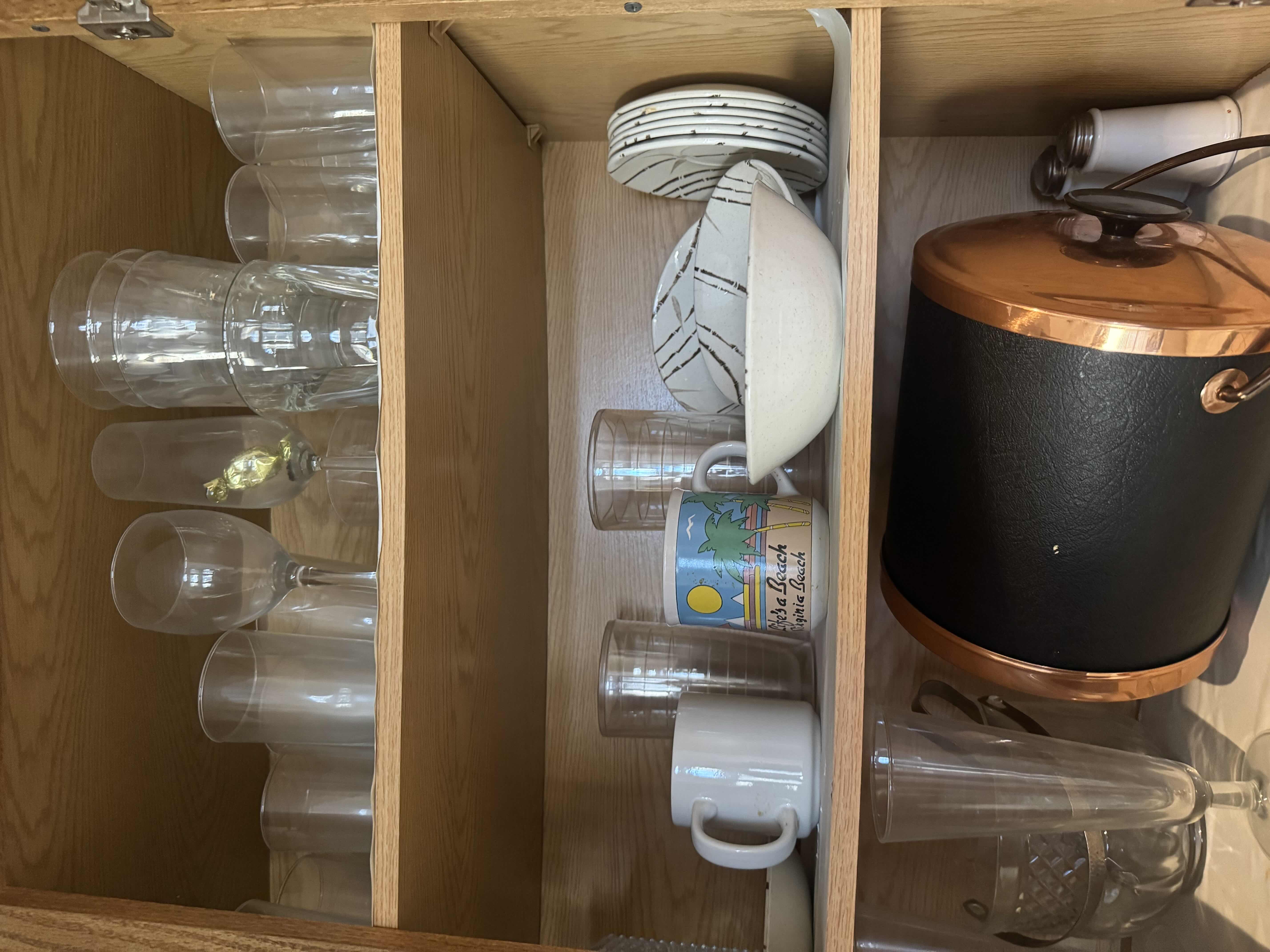 Photo 3 of CONTENTS OF KITCHEN CABINET. GLASSWARE AND BAR ACCESSORIES.