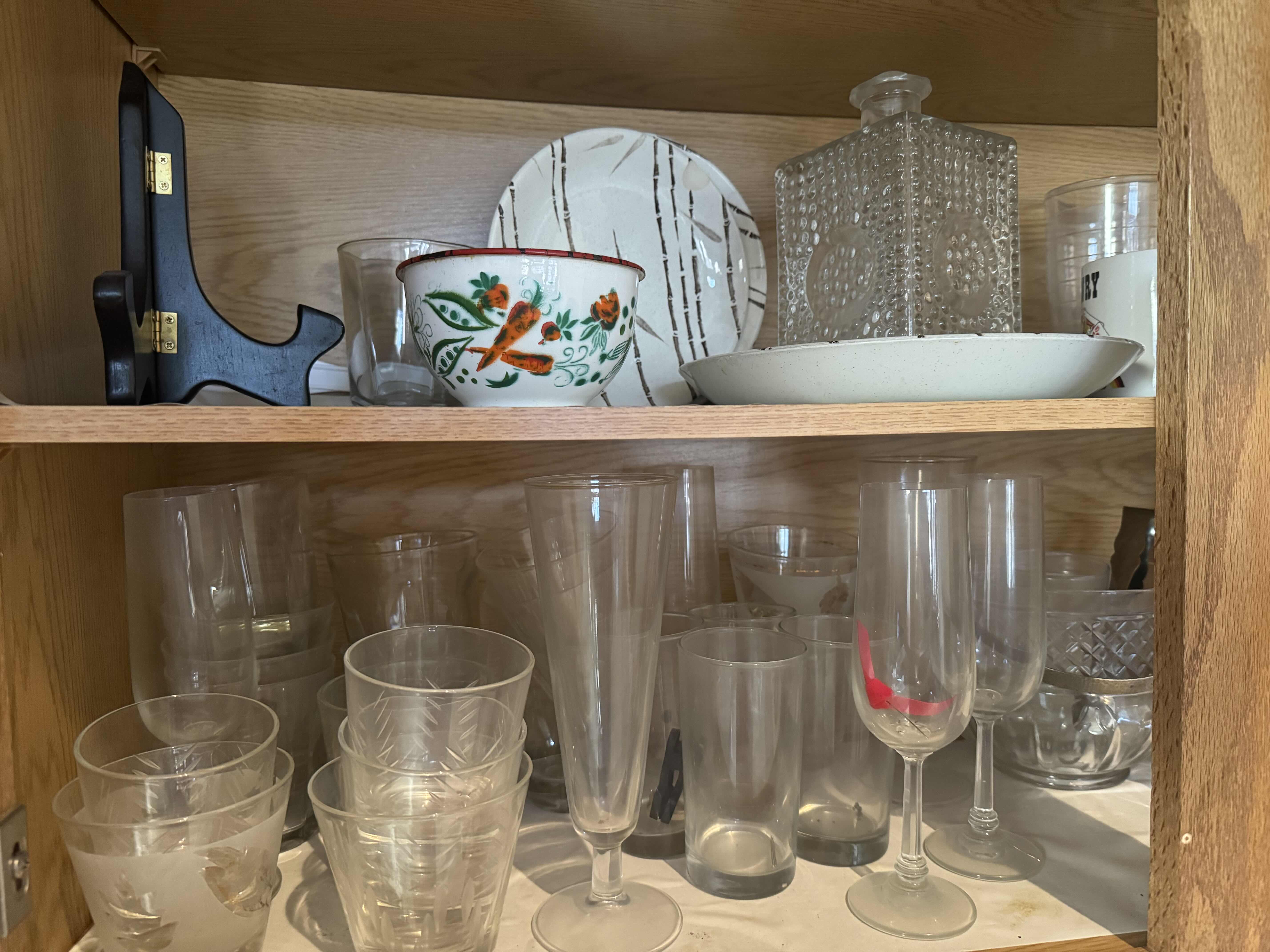 Photo 2 of CONTENTS OF KITCHEN CABINET. GLASSWARE AND BAR ACCESSORIES.
