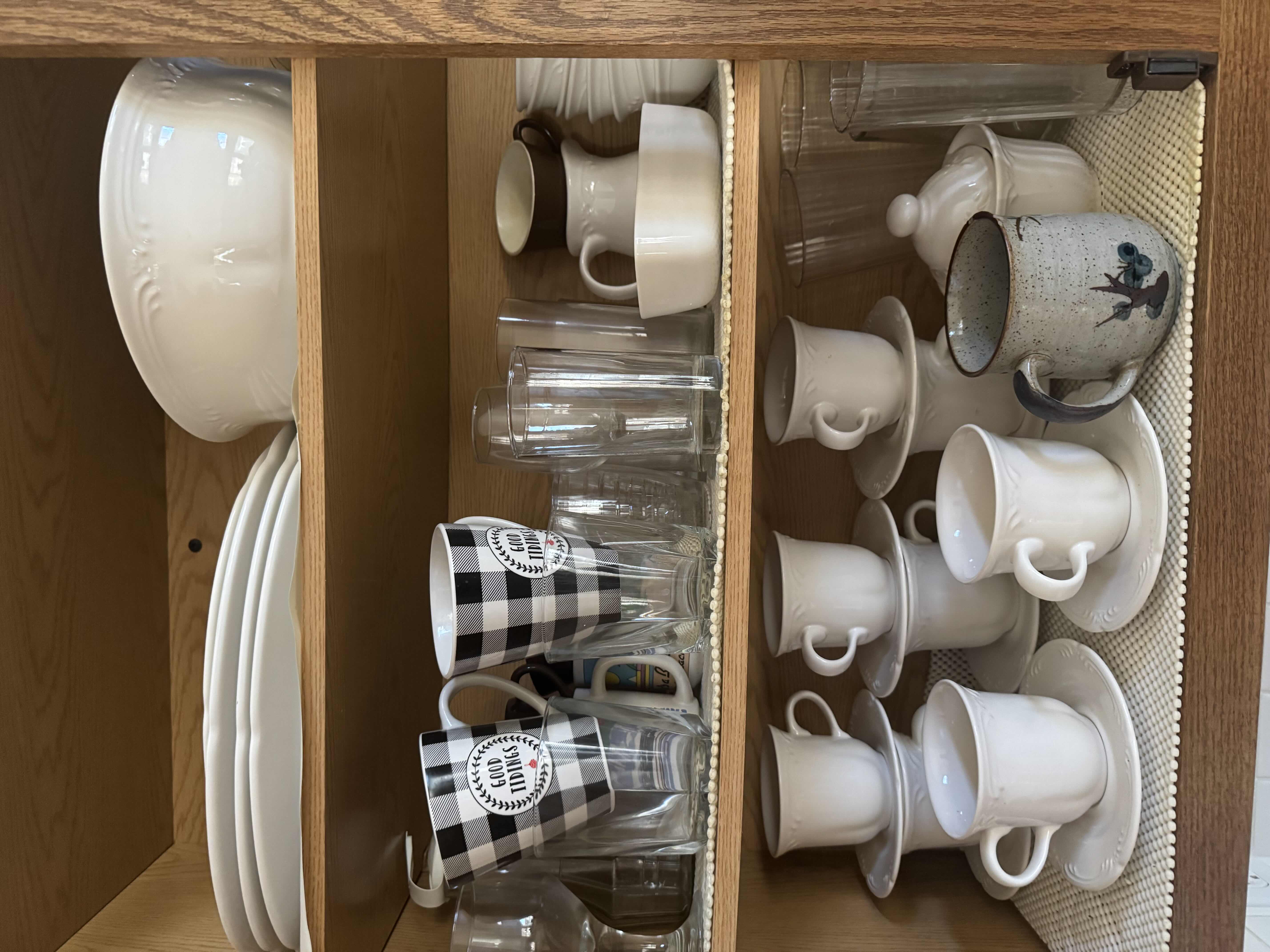 Photo 1 of CONTENTS OF KITCHEN CABINET. DISHES SET, BOWLS, PLATES, MUGS, AND GLASSES.
