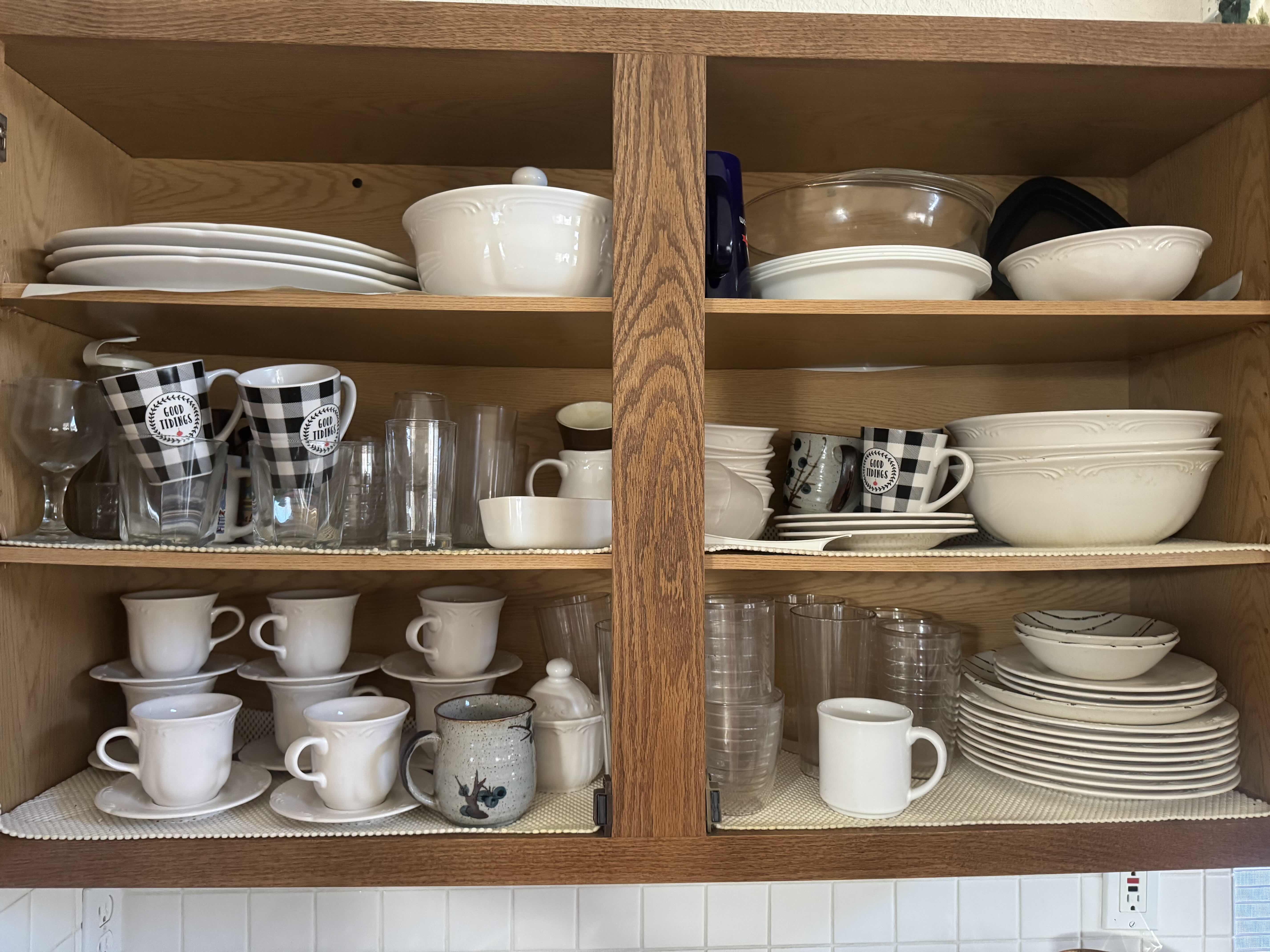 Photo 1 of CONTENTS OF KITCHEN CABINET. DISHES SET, BOWLS, PLATES, MUGS, AND GLASSES.