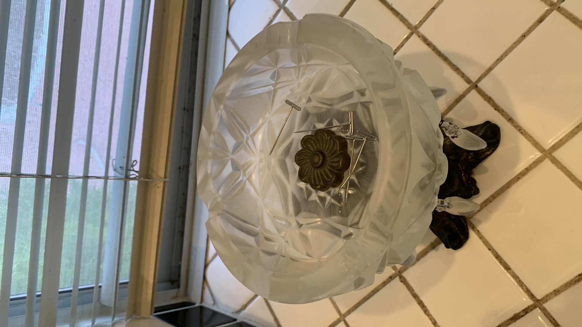 Photo 1 of HOME DECOR, GLAS AND BRASS CANDY BOWL 7” TALL