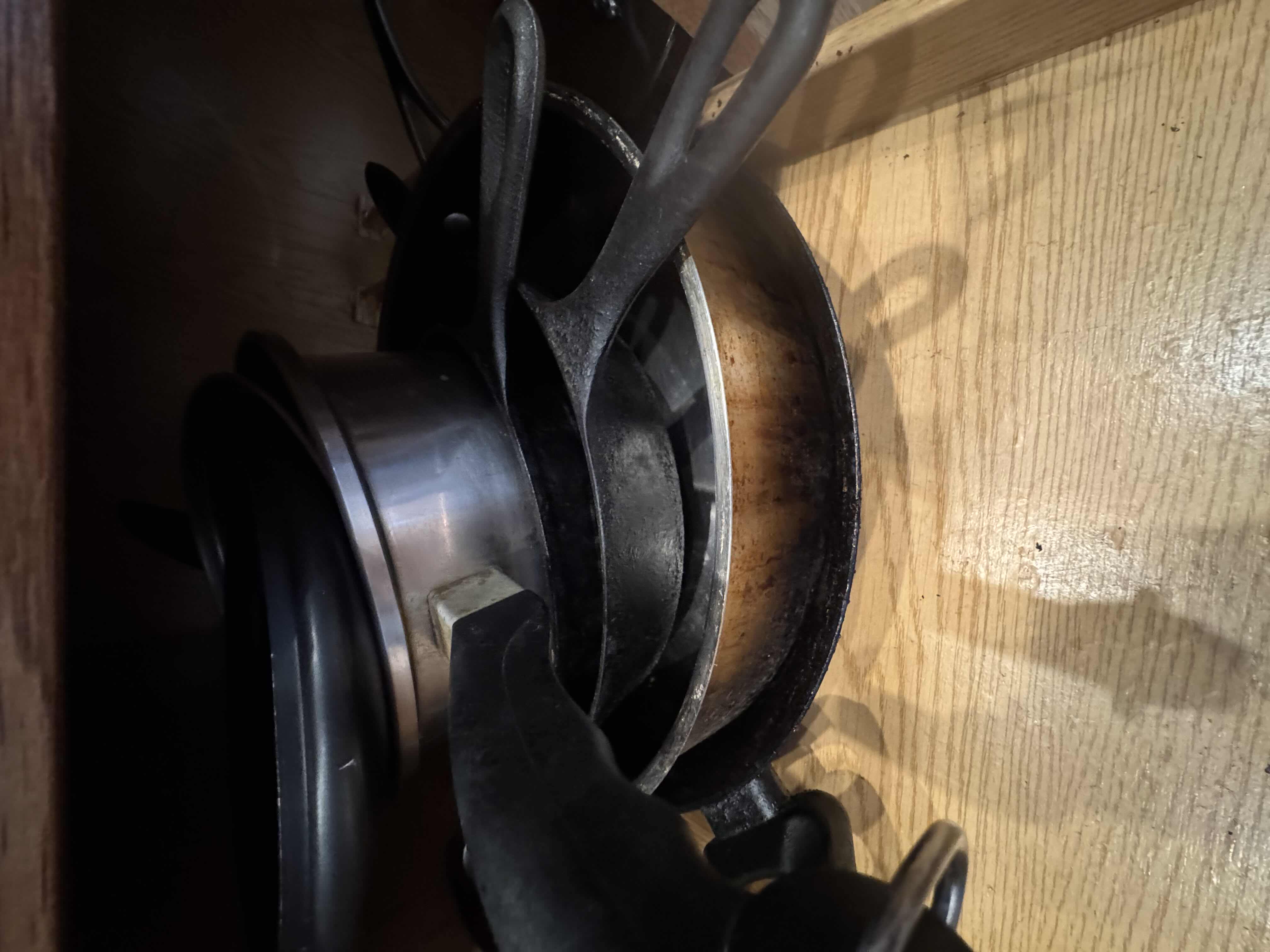 Photo 3 of CONTENTS OF KITCHEN CABINET. POTS AND PANS VARIOUS SIZES.