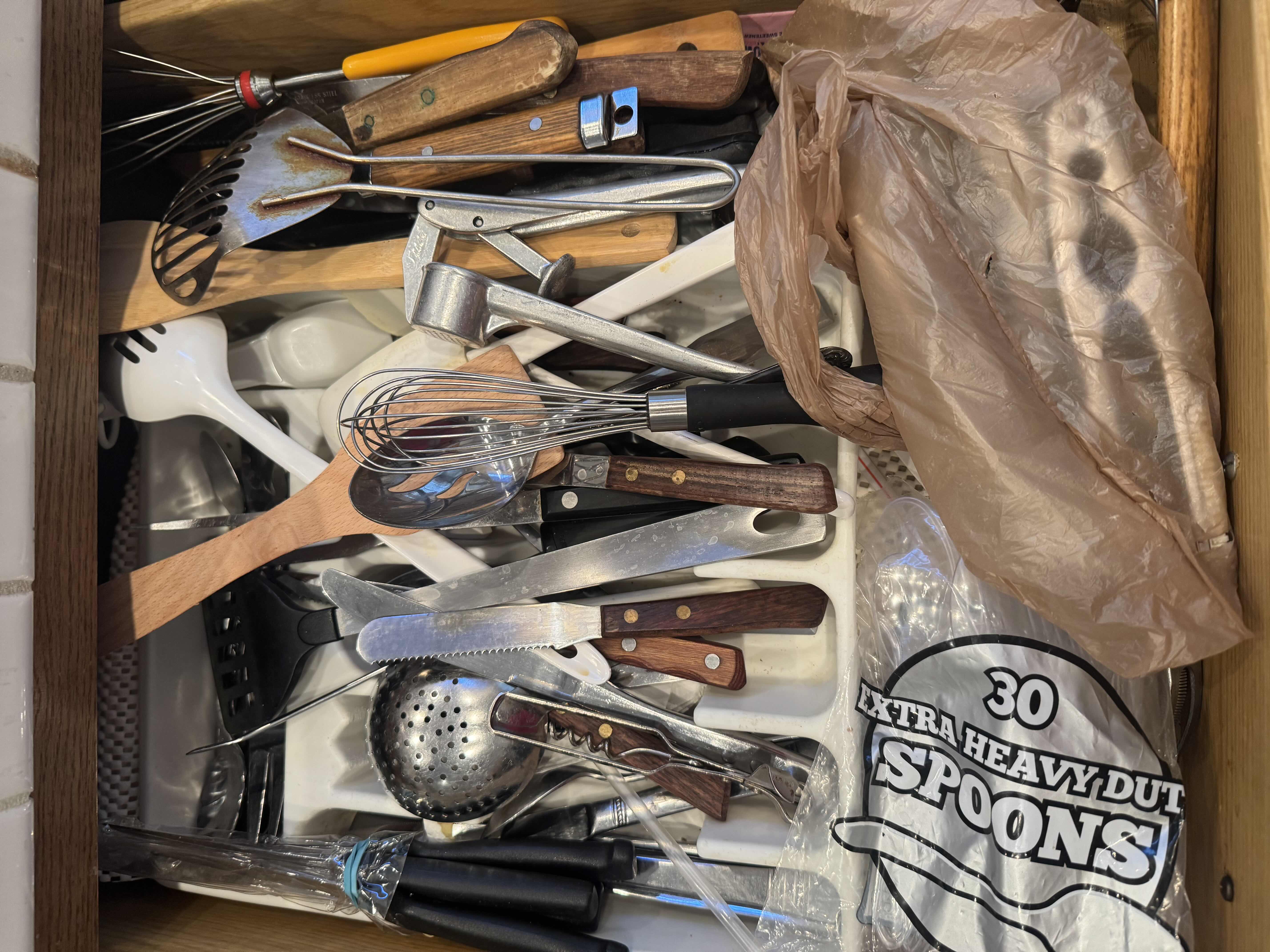 Photo 1 of CONTENTS OF KITCHEN DRAWER. KNIVES, WOODEN SPOONS, SPATULAS, ETC.