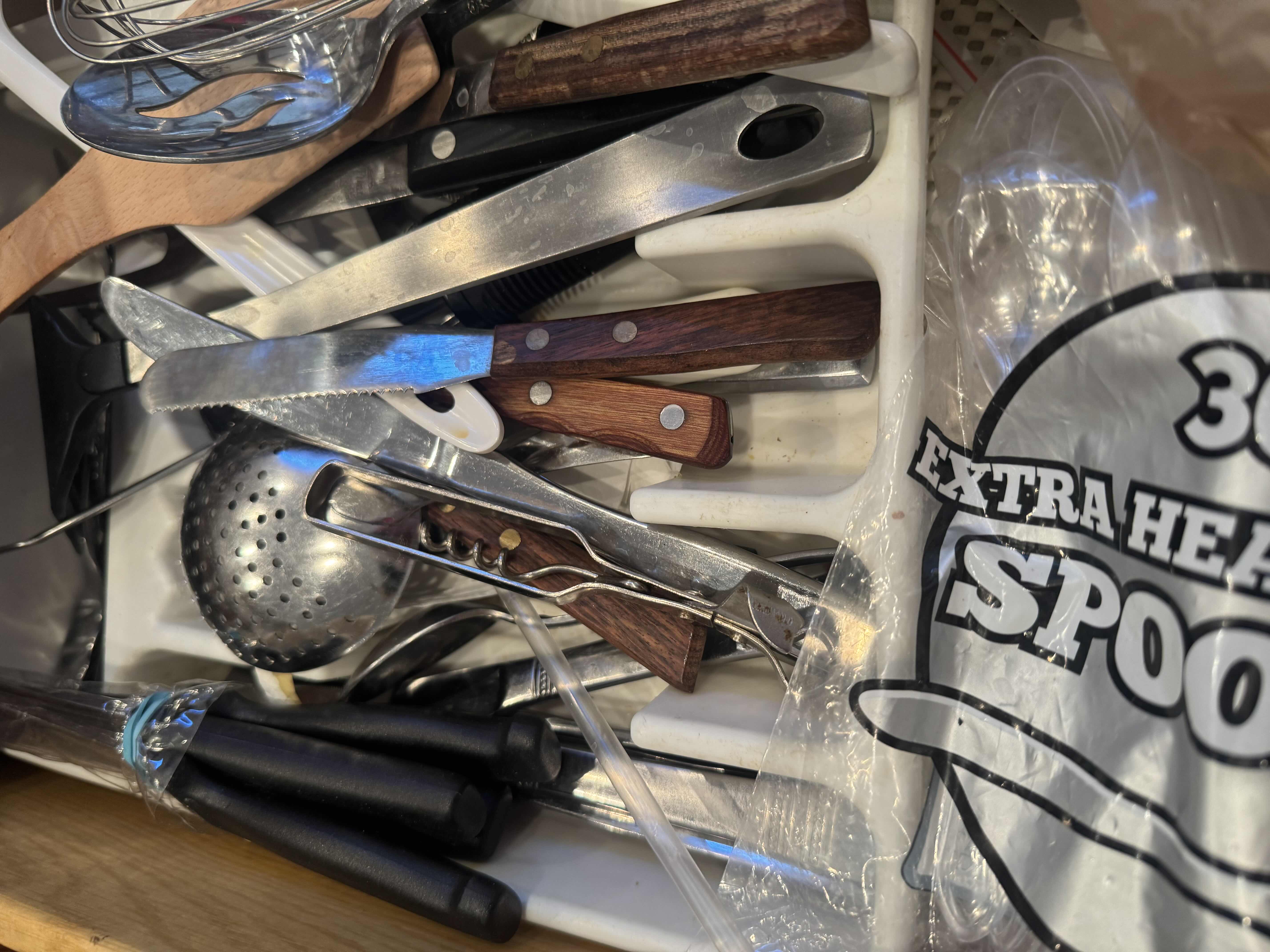 Photo 2 of CONTENTS OF KITCHEN DRAWER. KNIVES, WOODEN SPOONS, SPATULAS, ETC.