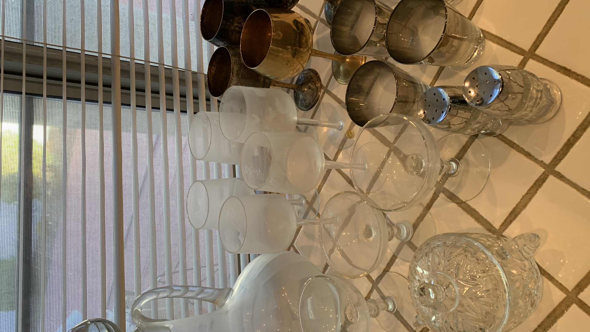 Photo 1 of ASSORTED GLASS AND BARWARE. WINE DECANTER, MARTINI GLASSES, CHRYSTAL CANDY JAR WITH LID, AND SALT AND PEPPER SHAKERS.