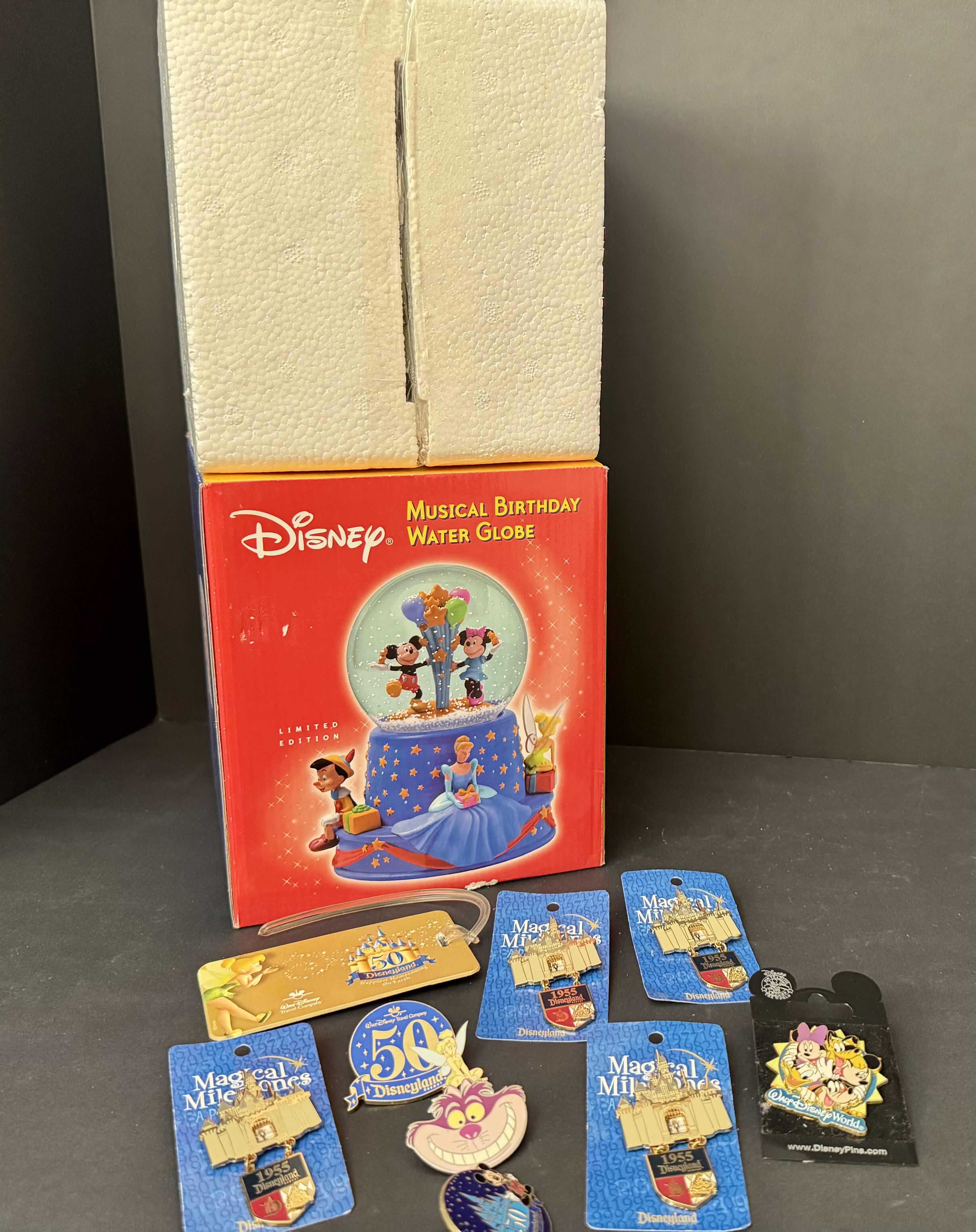 Photo 1 of 10- COLLECTIBLE DISNEY ITEMS (1) NIB MUSICAL BIRTHDAY WATER GLOBE AND (1) LUGGAGE TAG AND (8) COLLECTIBLE PINS