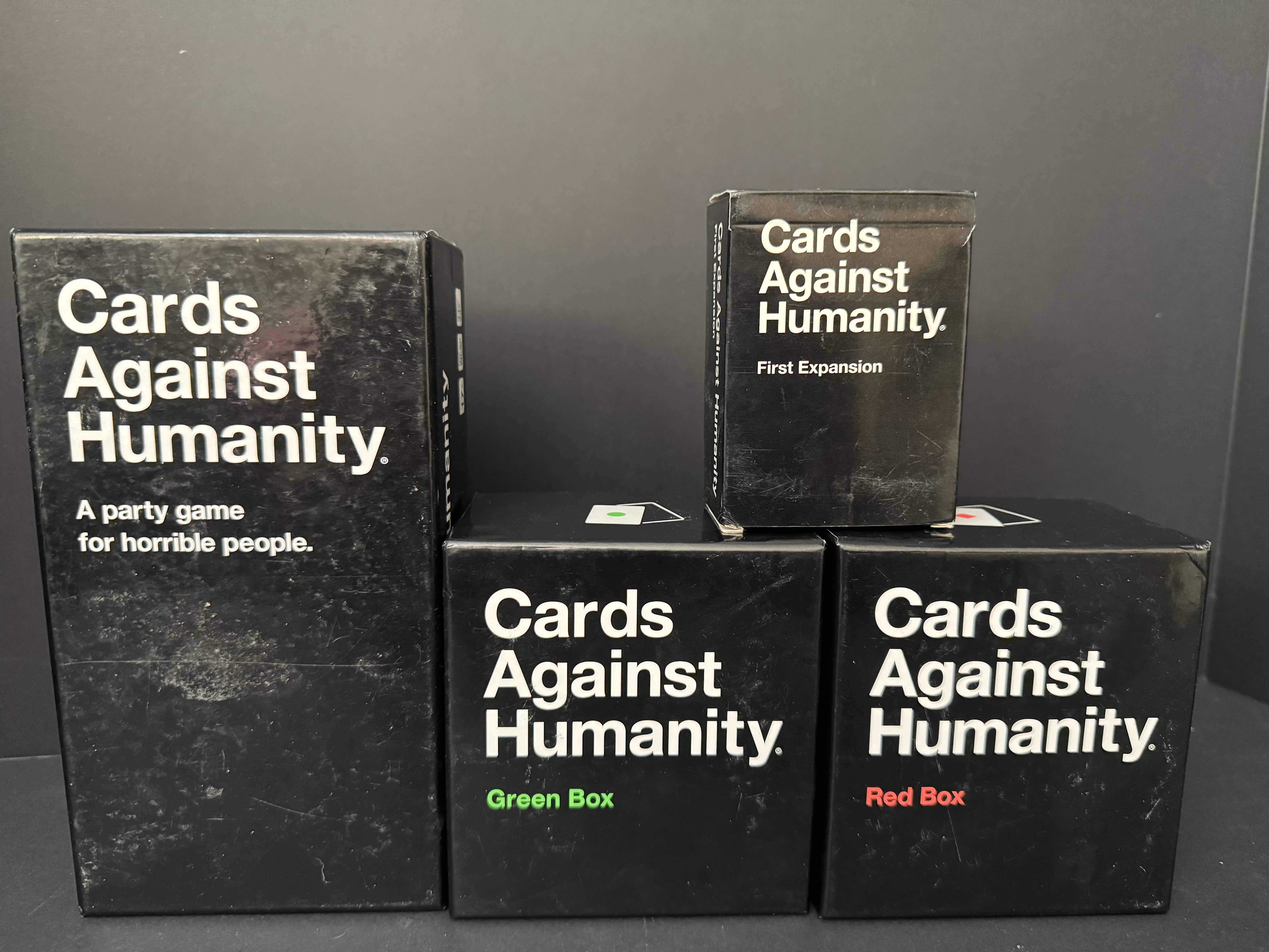 Photo 1 of CARDS AGAINST HUMANITY GAME WITH 3 EXPANSION PACKS