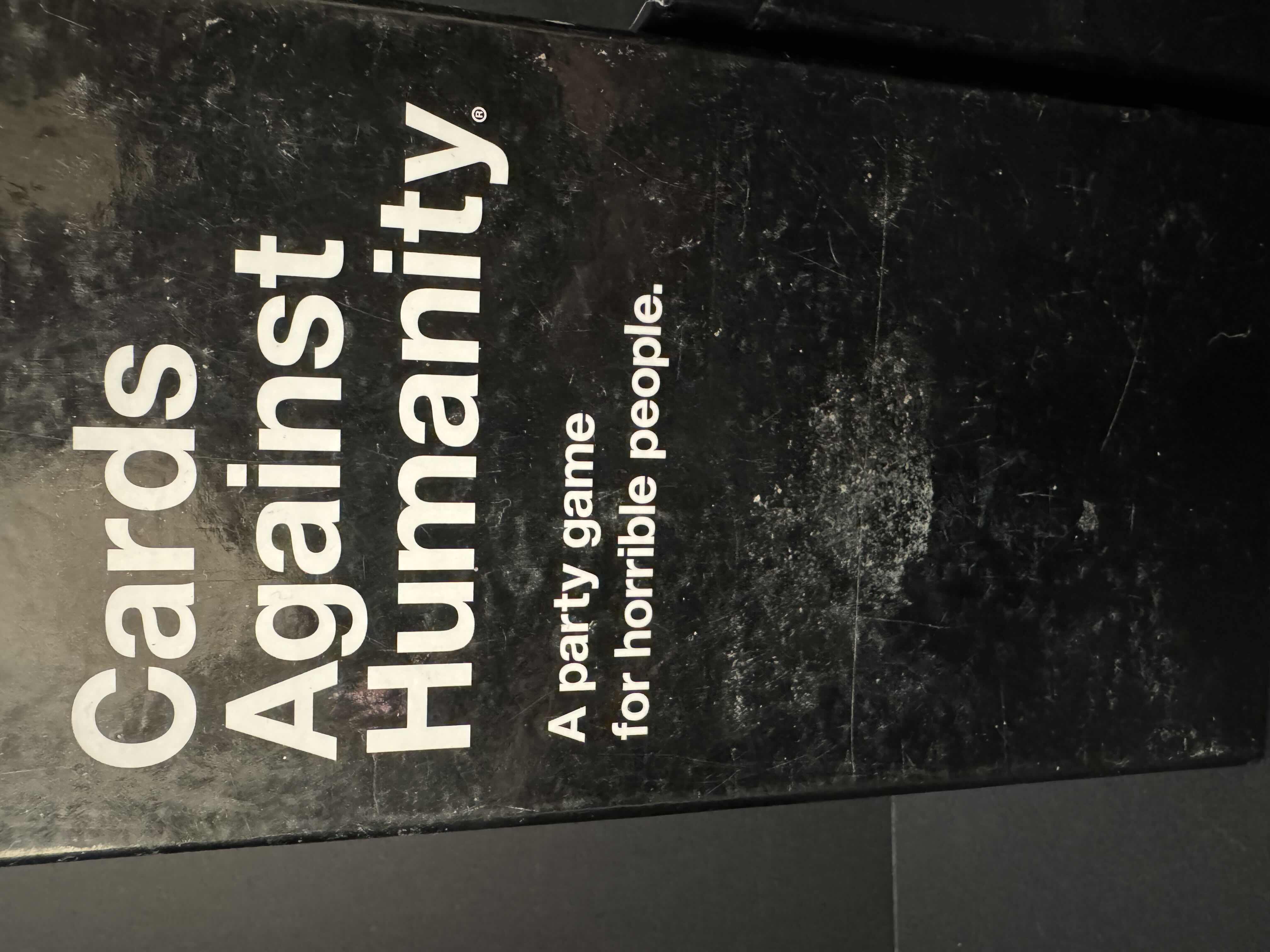 Photo 2 of CARDS AGAINST HUMANITY GAME WITH 3 EXPANSION PACKS