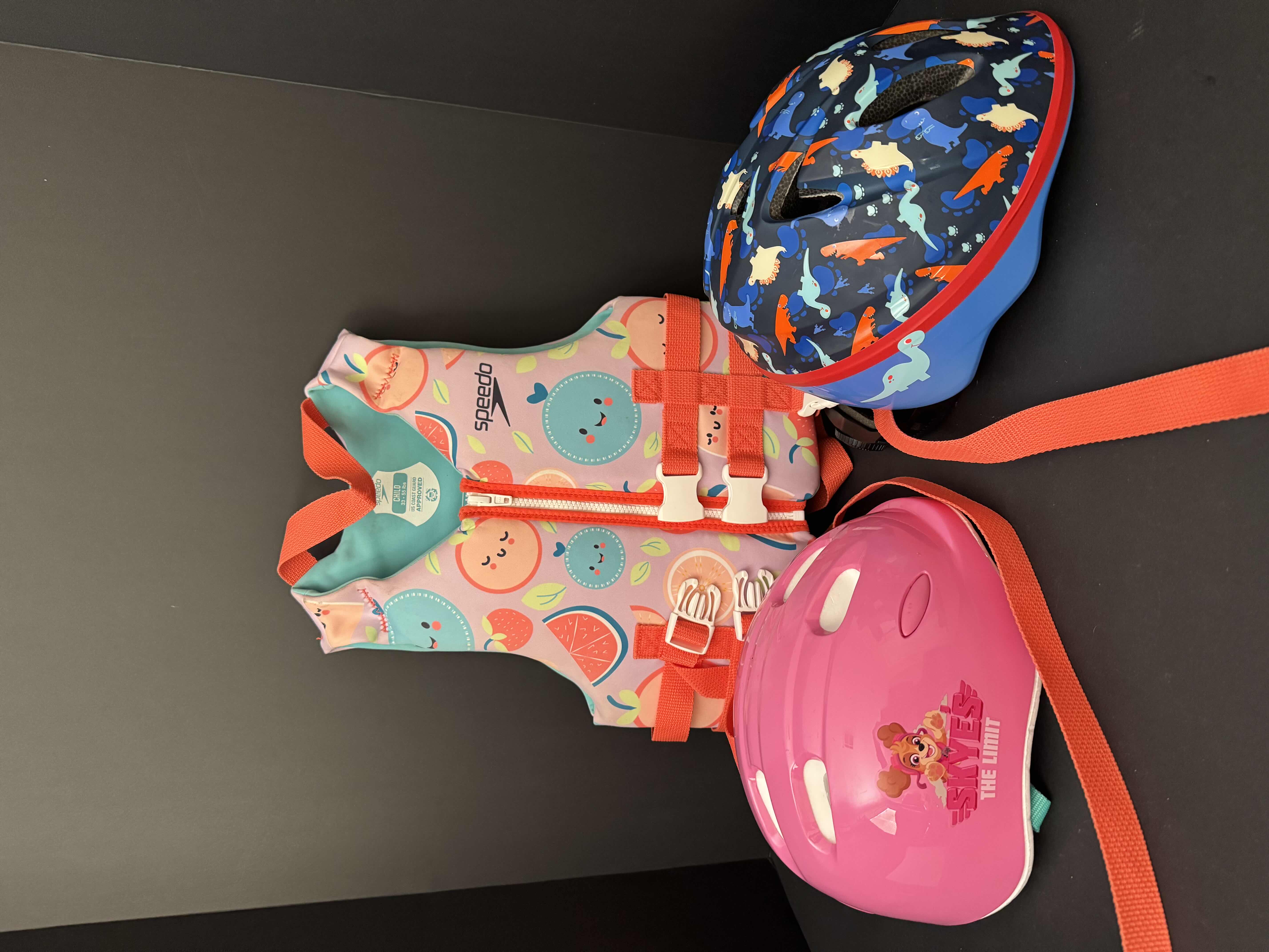 Photo 1 of 2 TODDLER SIZED HELMETS AND ONE LIFE VEST