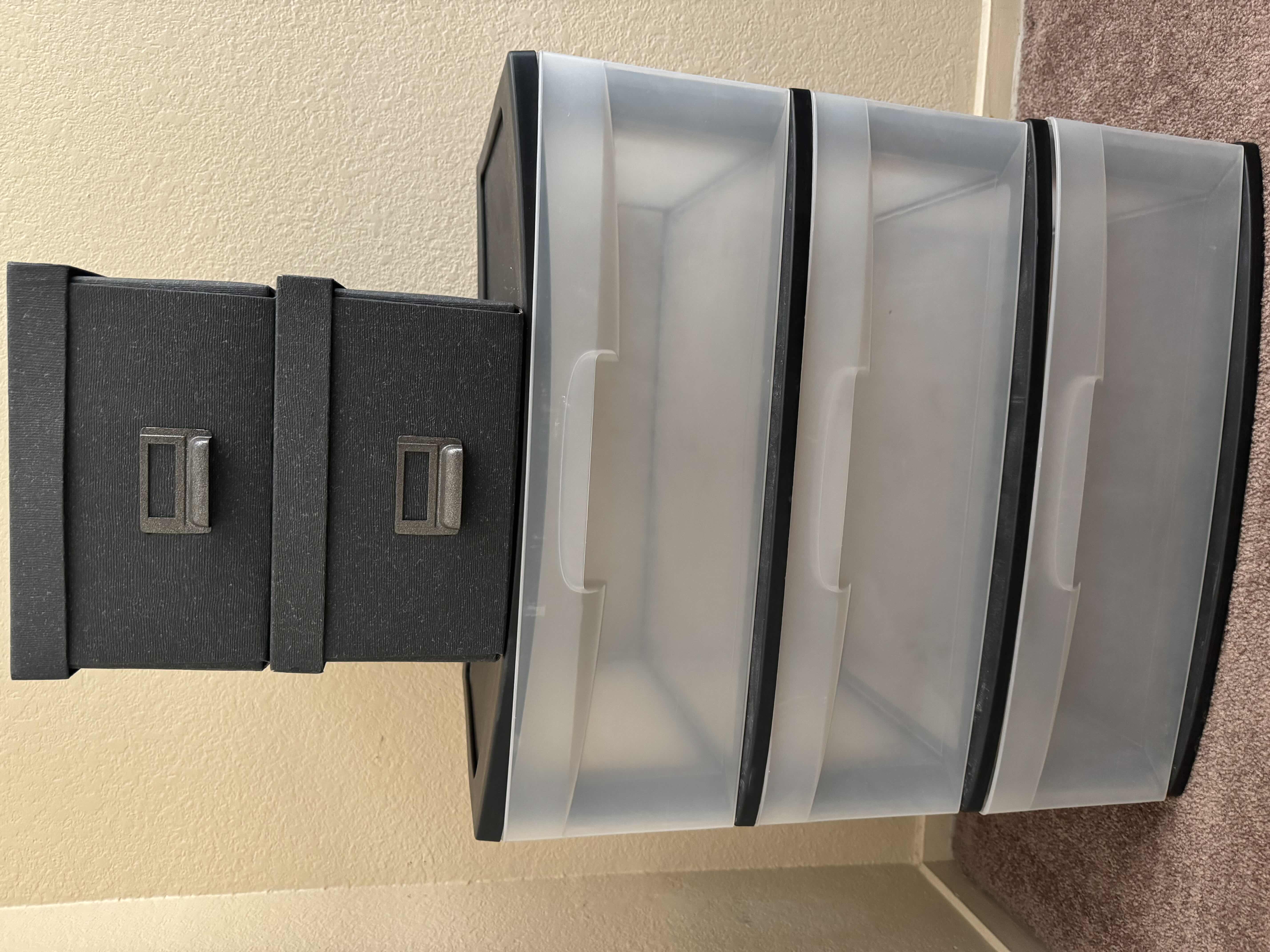 Photo 1 of 3 CONTAINERS (1) PLASTIC 4 DRAWER CONTAINER 22” X 16” H 24”
(2)-CARD BOARD DECORATIVE BOXES 10” X 13” H 6”