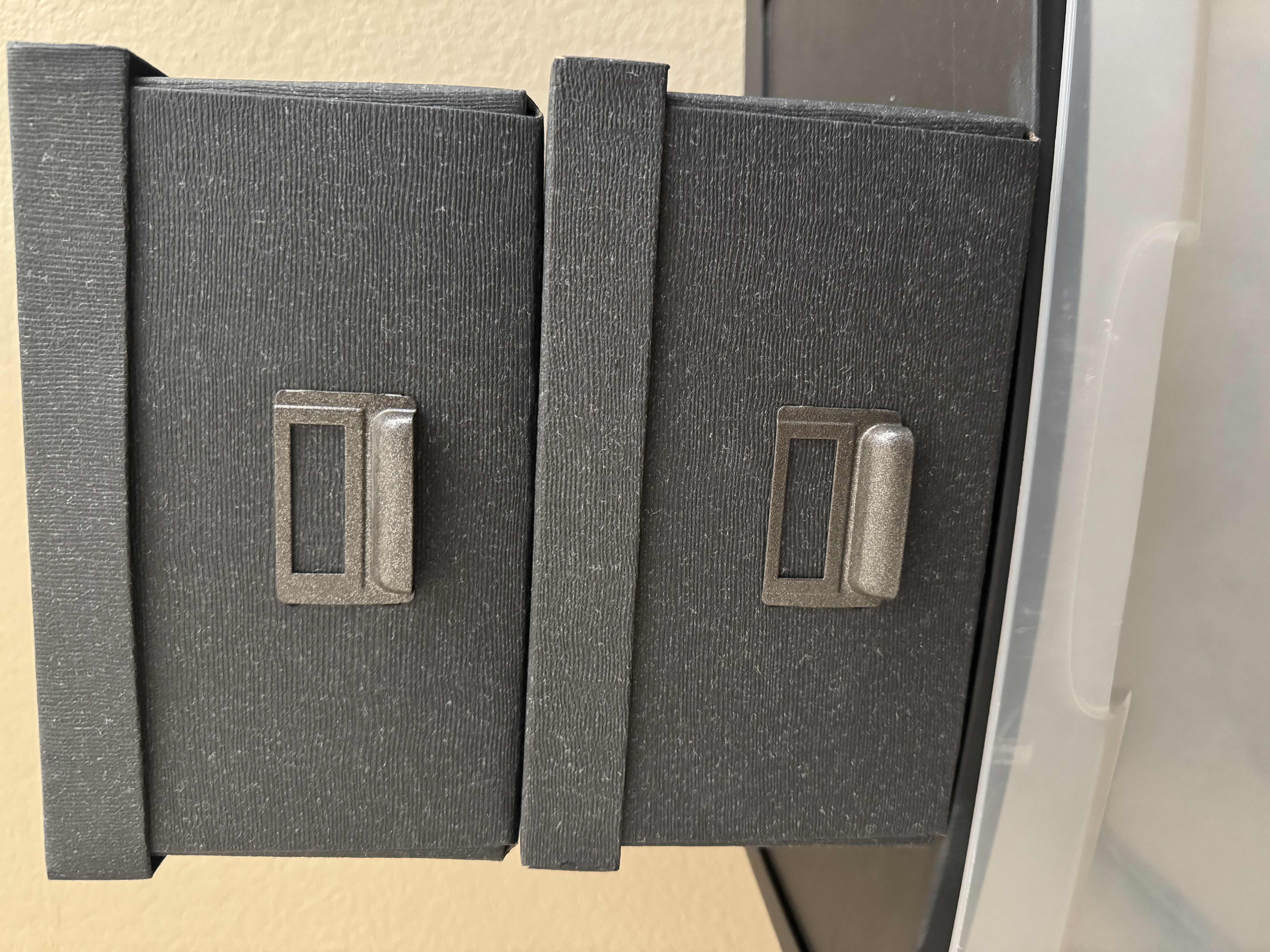 Photo 1 of 3 CONTAINERS (1) PLASTIC 4 DRAWER CONTAINER 22” X 16” H 24”
(2)-CARD BOARD DECORATIVE BOXES 10” X 13” H 6”