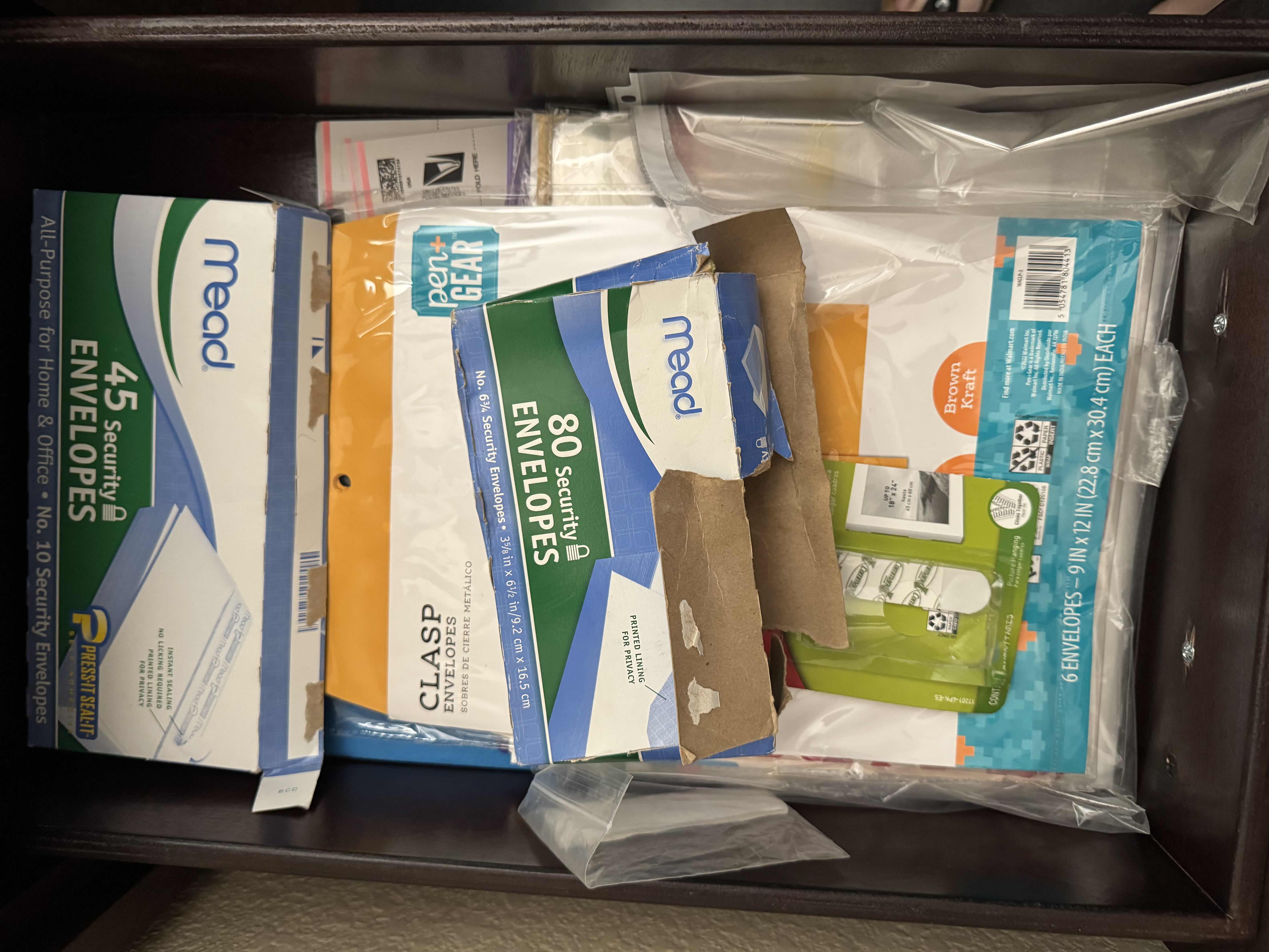 Photo 1 of CONTENTS OF 3 DESK DRAWERS