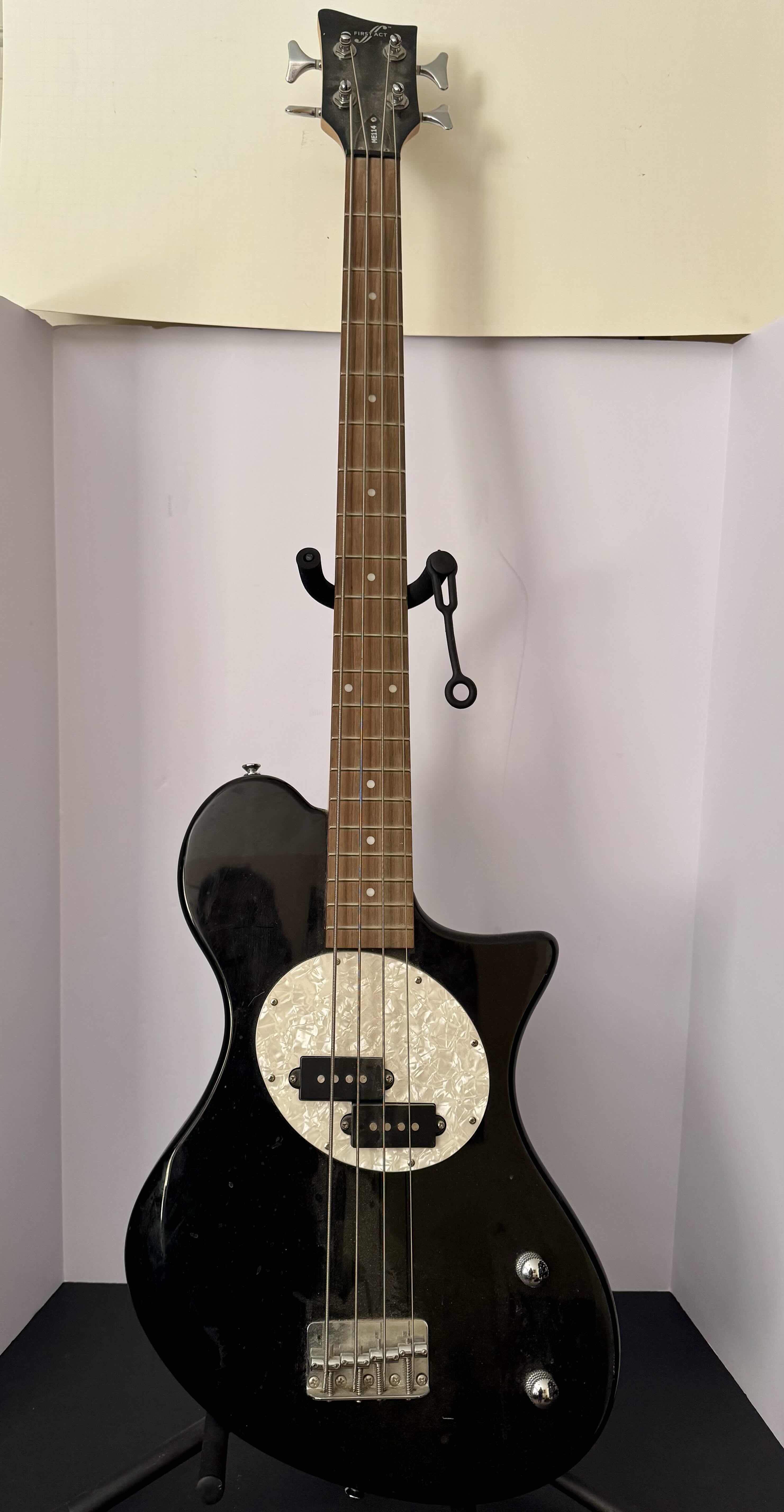 Photo 1 of FIRST ACT ELECTRIC BASS GUITAR WITH STAND