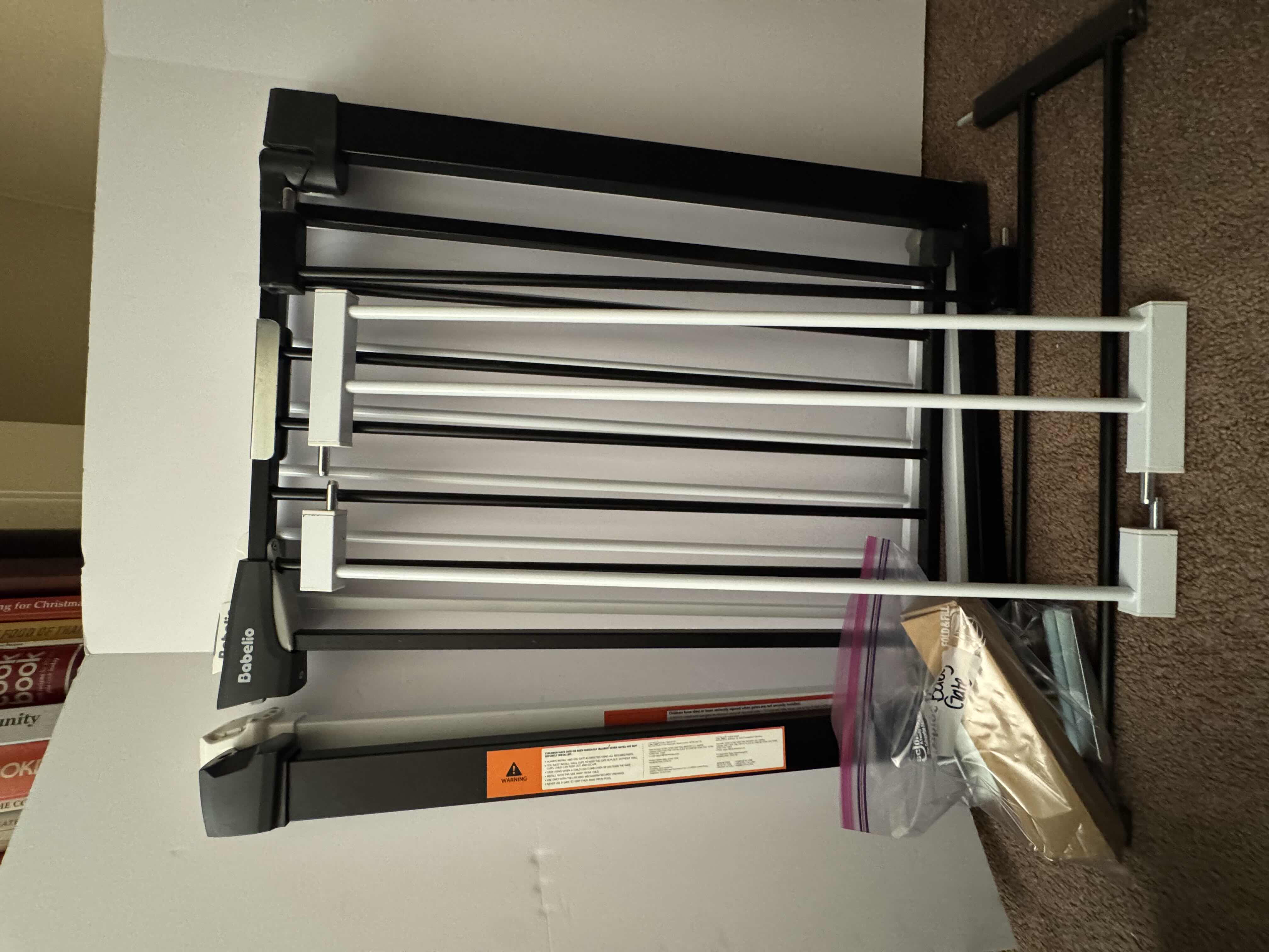 Photo 1 of 2- BABELIO BABY GATES IN WHITE AND BLACK