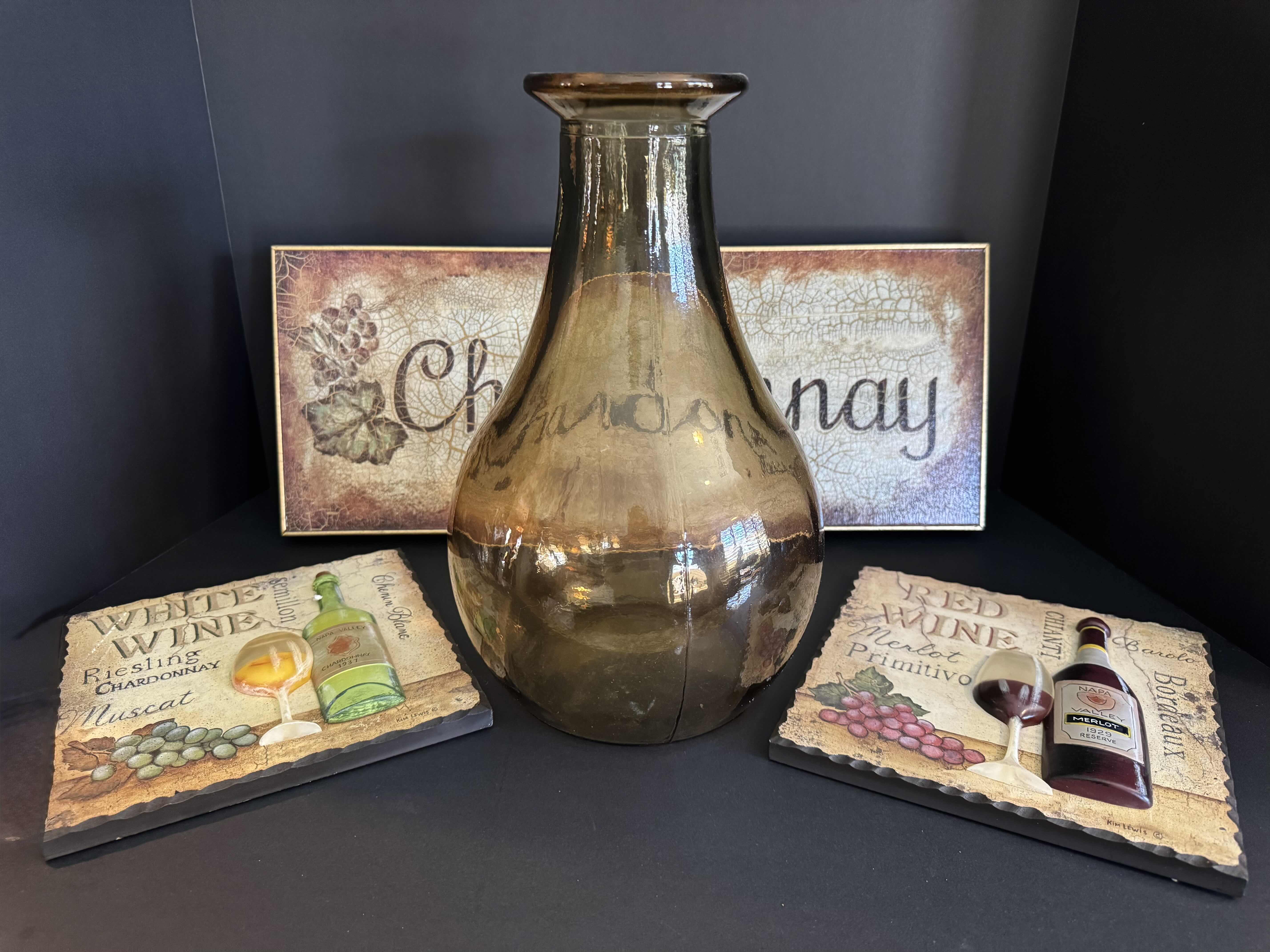 Photo 1 of ASSORTED DECORATIVE ESSENTIALS ARTWORK 
VASE 12”H 
CHARDONNAY FRAME 8.5”H X 20”L
RED WINE FRAME 8”H X 8”L
WHITE WINE FRAME 8”H X 8”L