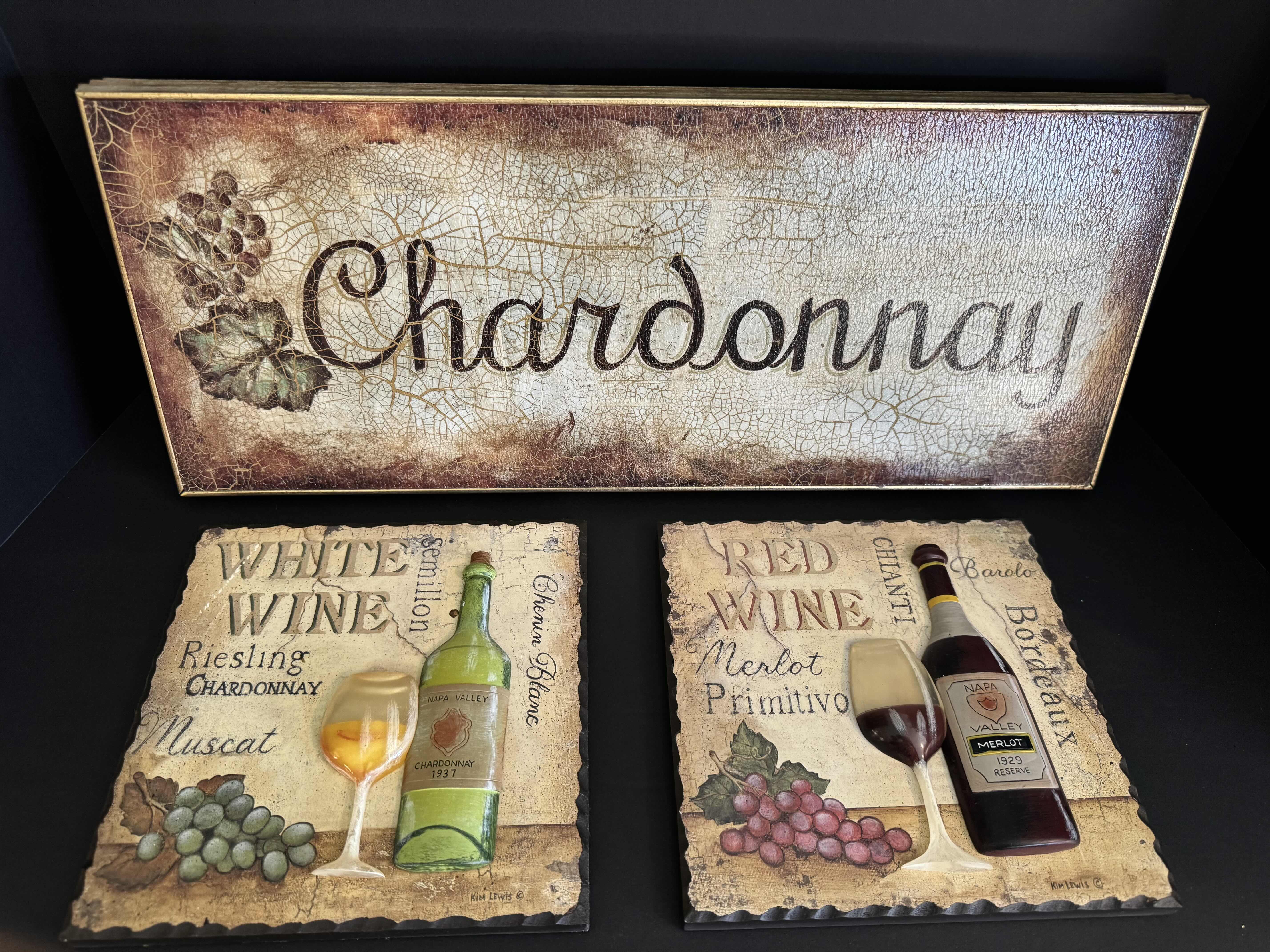 Photo 1 of ASSORTED DECORATIVE ESSENTIALS ARTWORK 
VASE 12”H 
CHARDONNAY FRAME 8.5”H X 20”L
RED WINE FRAME 8”H X 8”L
WHITE WINE FRAME 8”H X 8”L