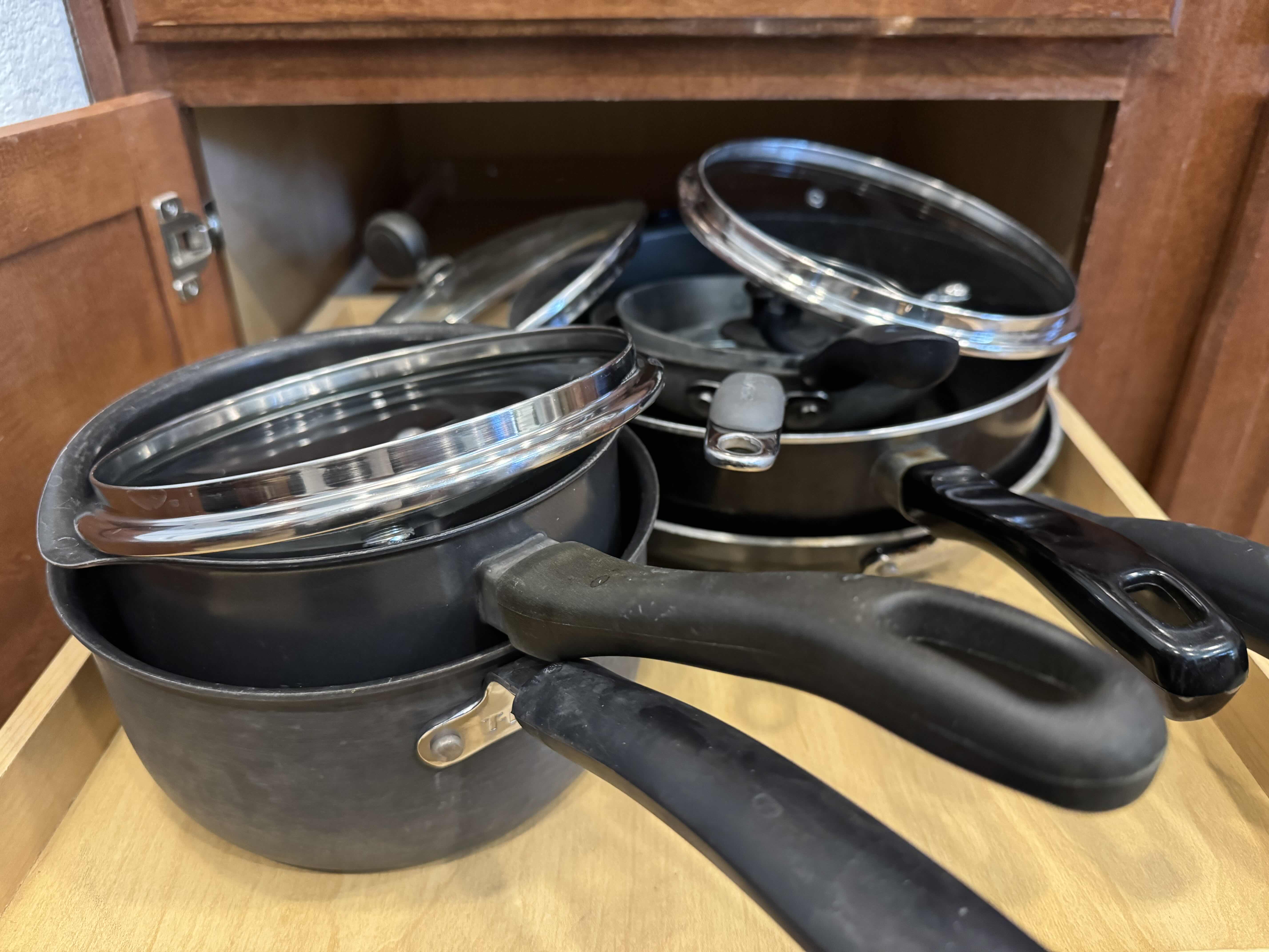 Photo 2 of CONTENTS OF CABINET- COOKWARE