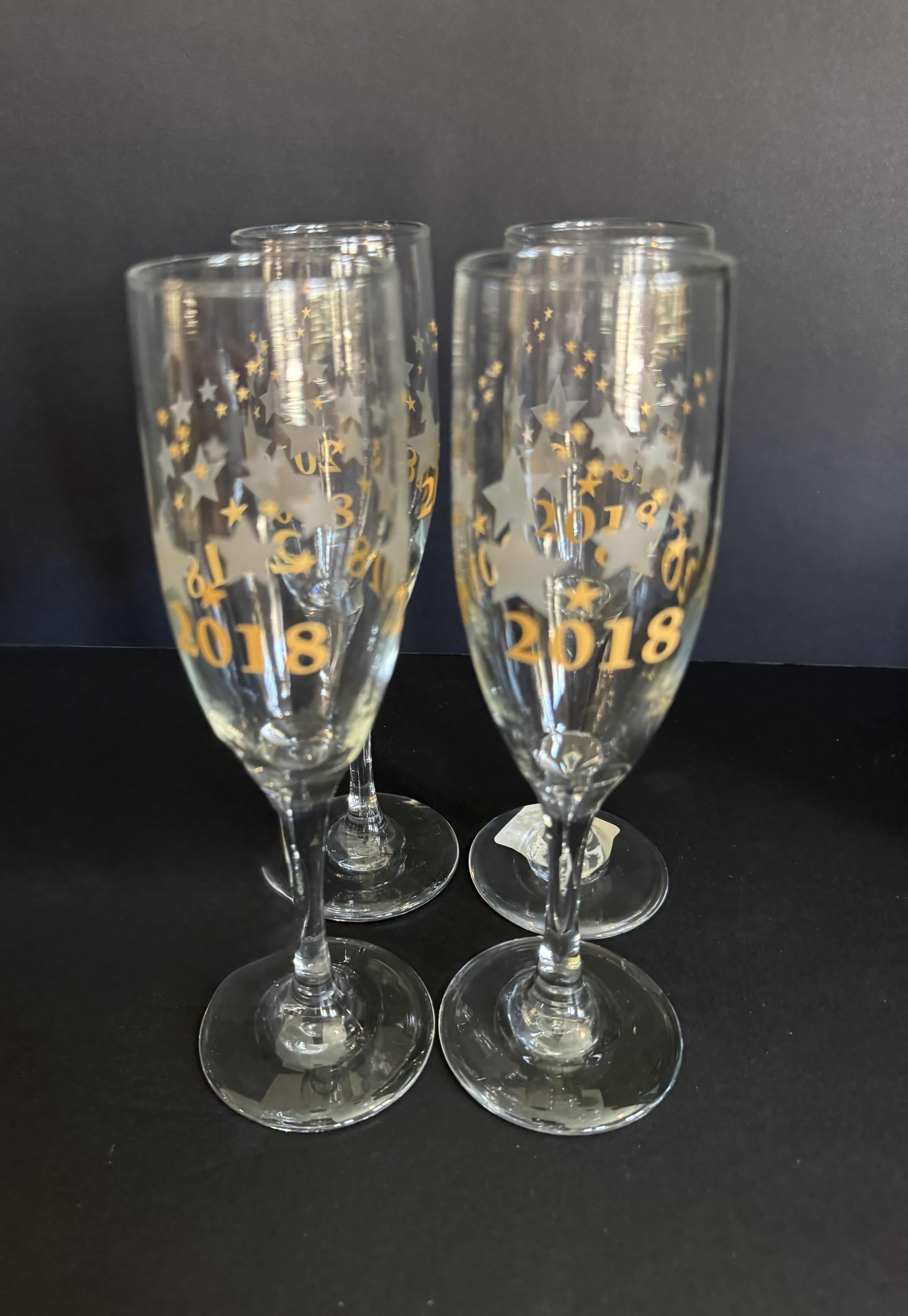 Photo 1 of HOME DECOR-NEW YEARS COMMEMORATIVE CHAMPAGNE GLASSES SET OF 4, 8”H-TABLE RUNNER 36”-CRYSTAL CANDY DISH 3”H X 5.5”D-CANDLE 3”H X 4.5”D
