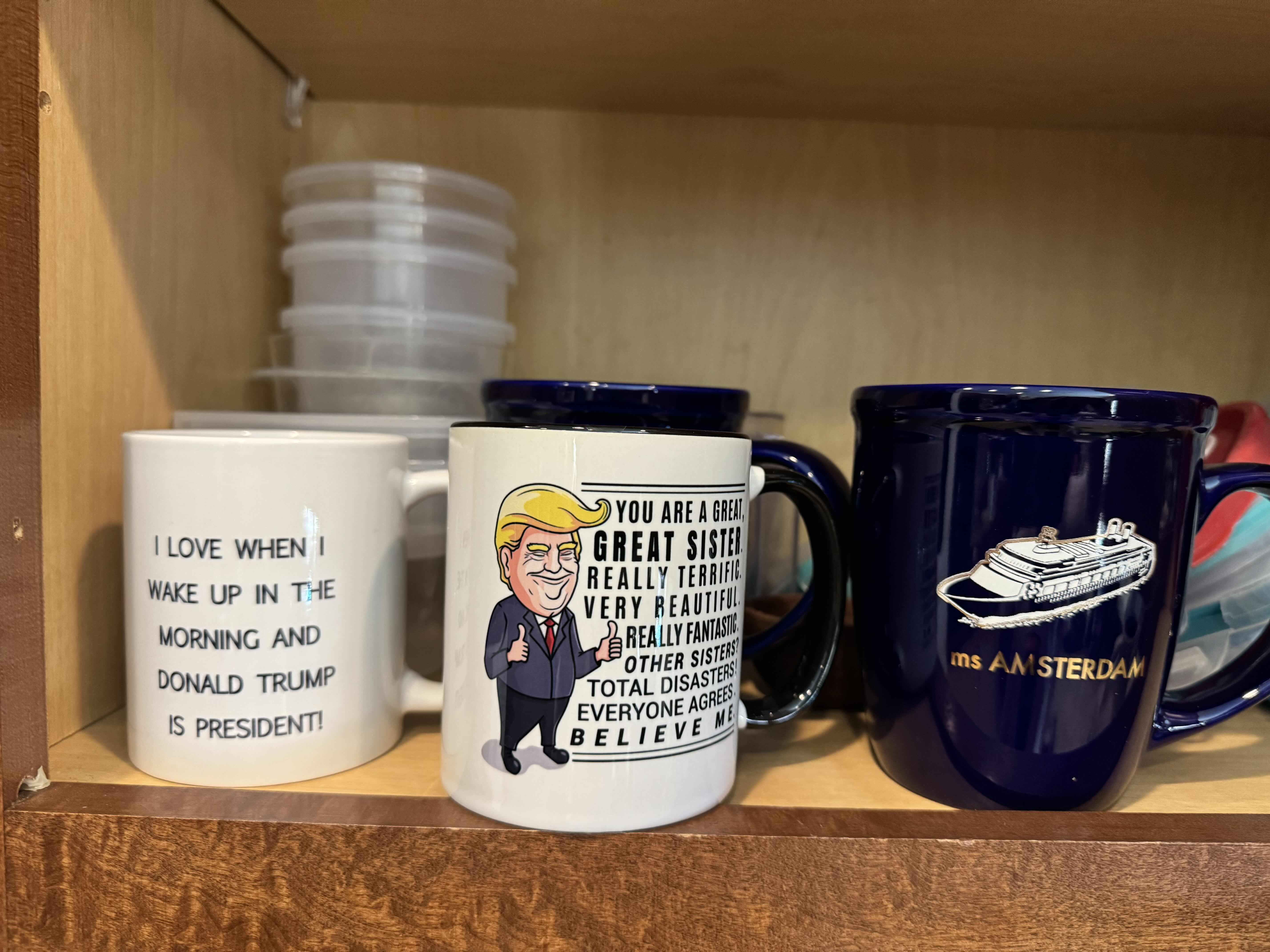 Photo 1 of CONTENTS OF  KITCHEN CABINET. MISC MUGS AND CUPS.