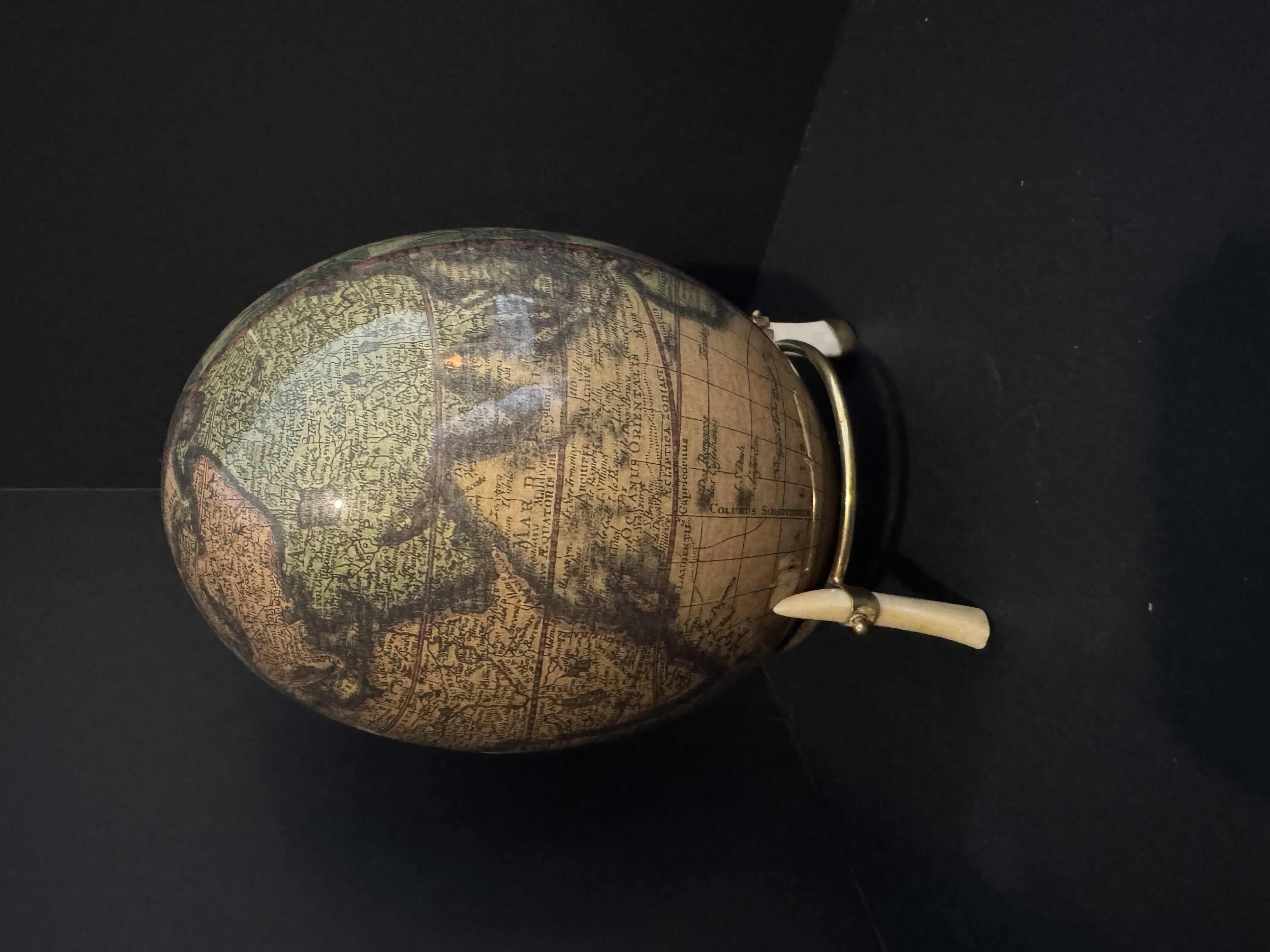 Photo 1 of ANTIQUE DECOPAUGE WORLD MAP OSTRICH EGG ON IVORY STAND