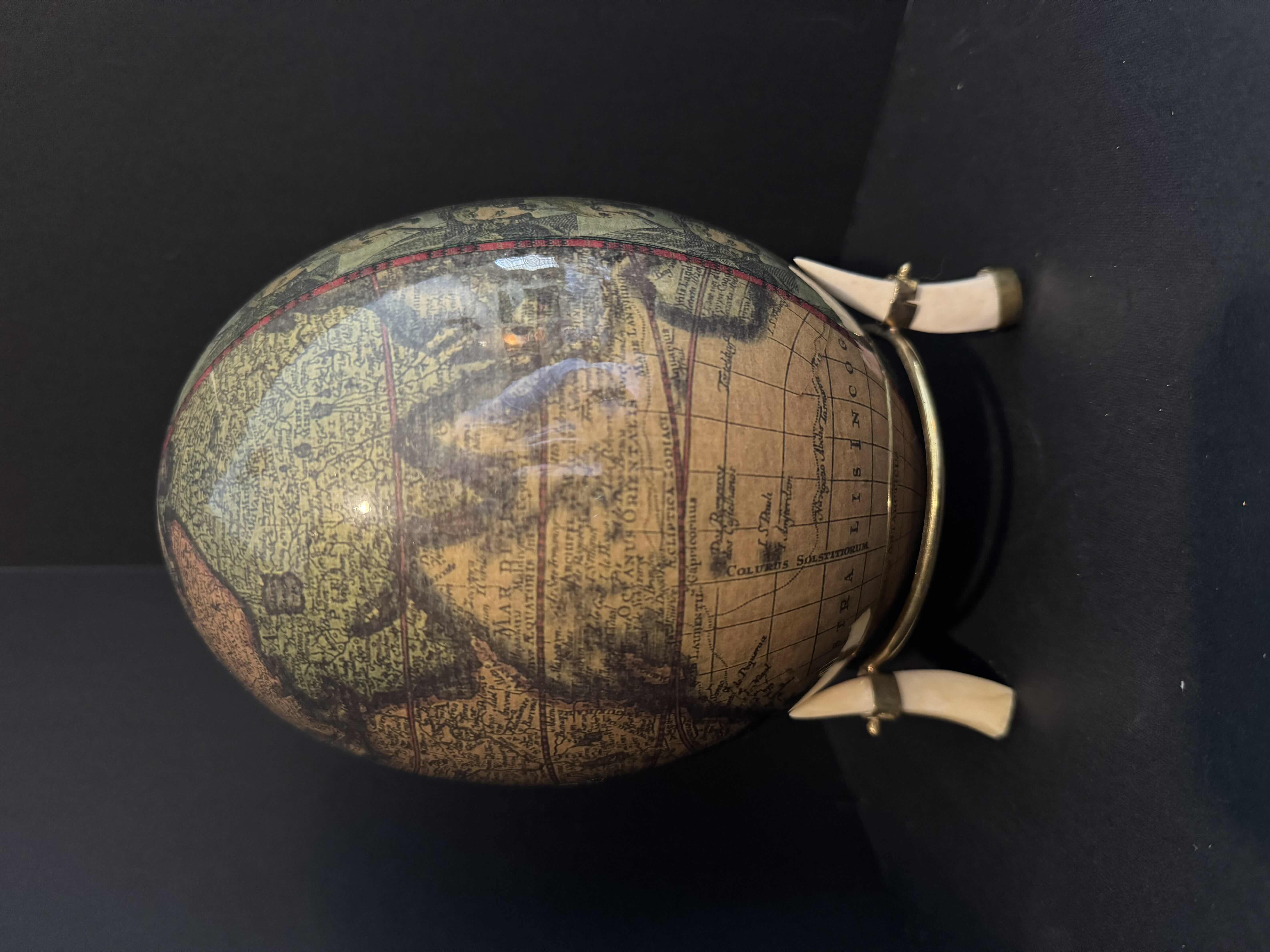 Photo 1 of ANTIQUE DECOPAUGE WORLD MAP OSTRICH EGG ON IVORY STAND