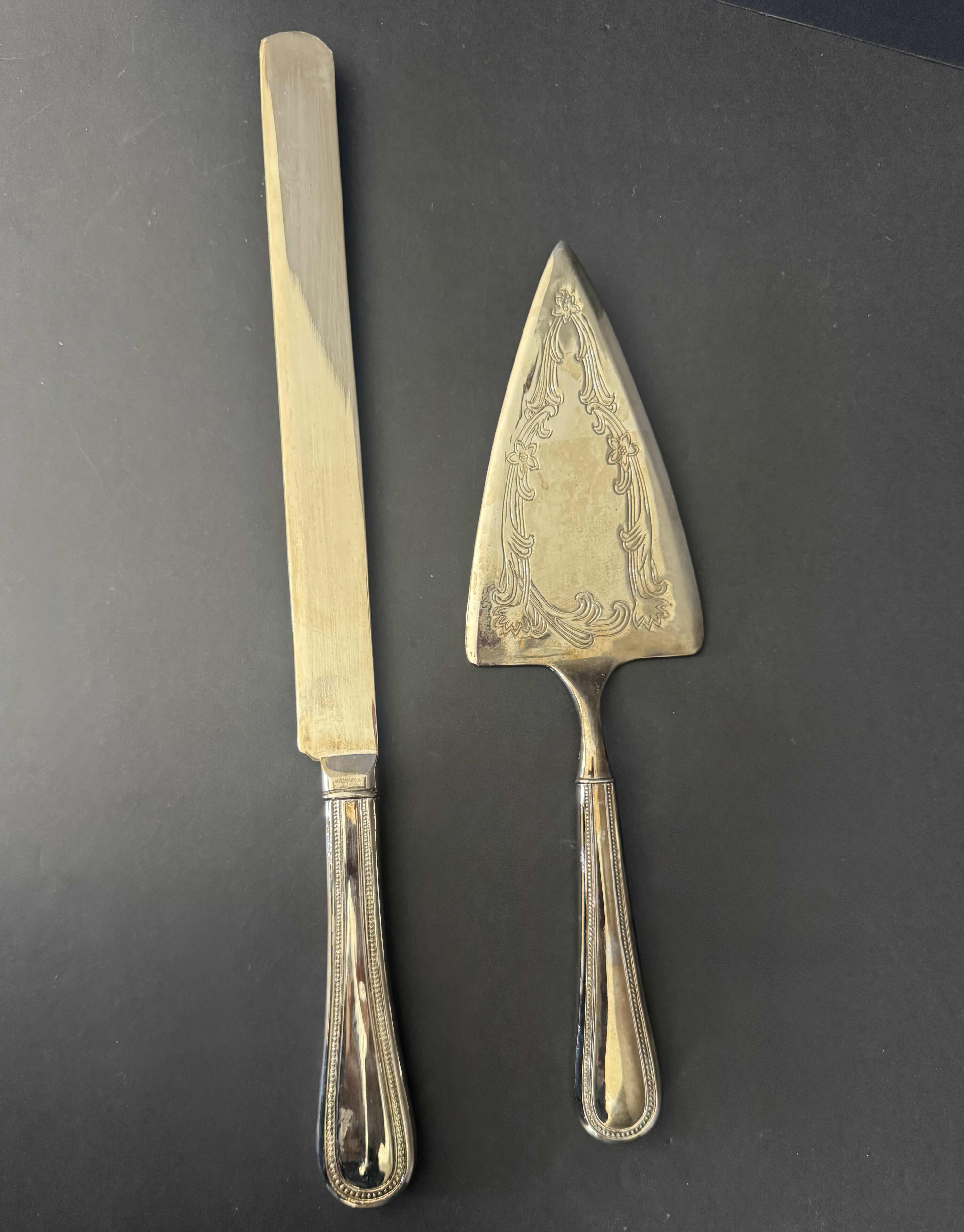 Photo 1 of 2-VINTAGE CAKE AND KNIFE SERVER SET, PIE SERVER SET, SILVER PLATED
KNIFE 14”H AND CAKE SERVER 10.5”H