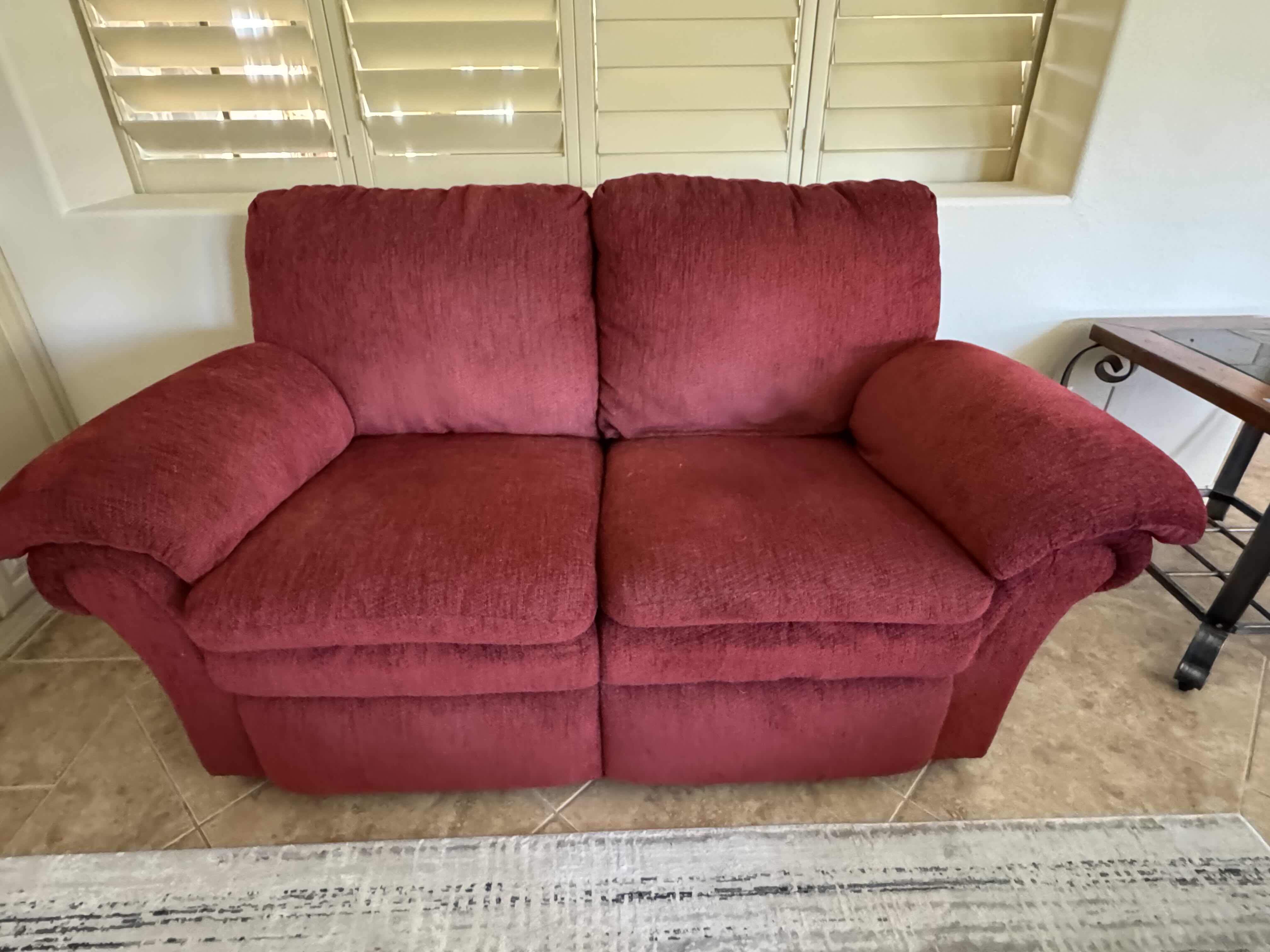 Photo 2 of BURGUNDY DOUBLE RECLINER SOFA  70” X 36”