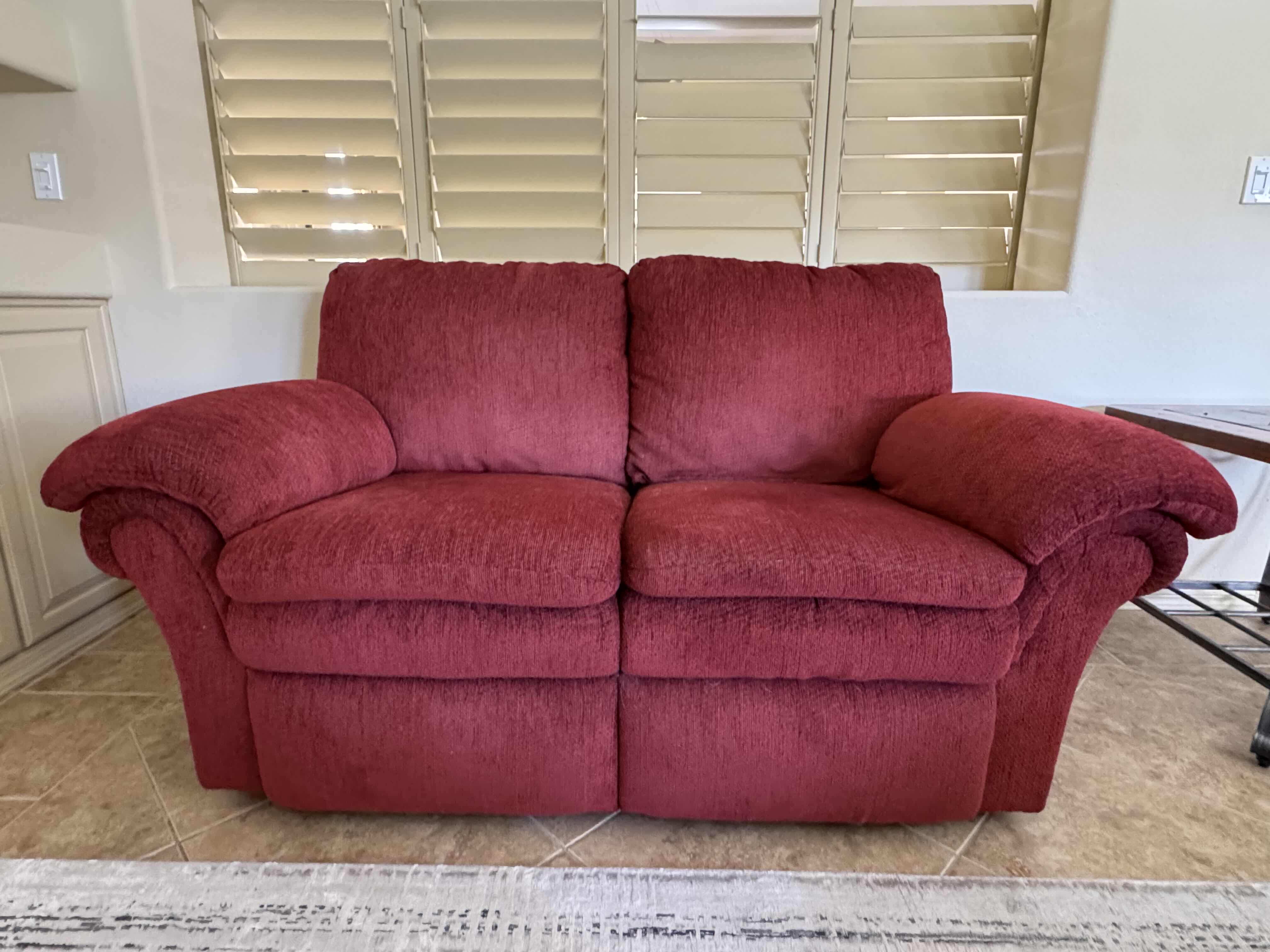 Photo 1 of BURGUNDY DOUBLE RECLINER SOFA  70” X 36”